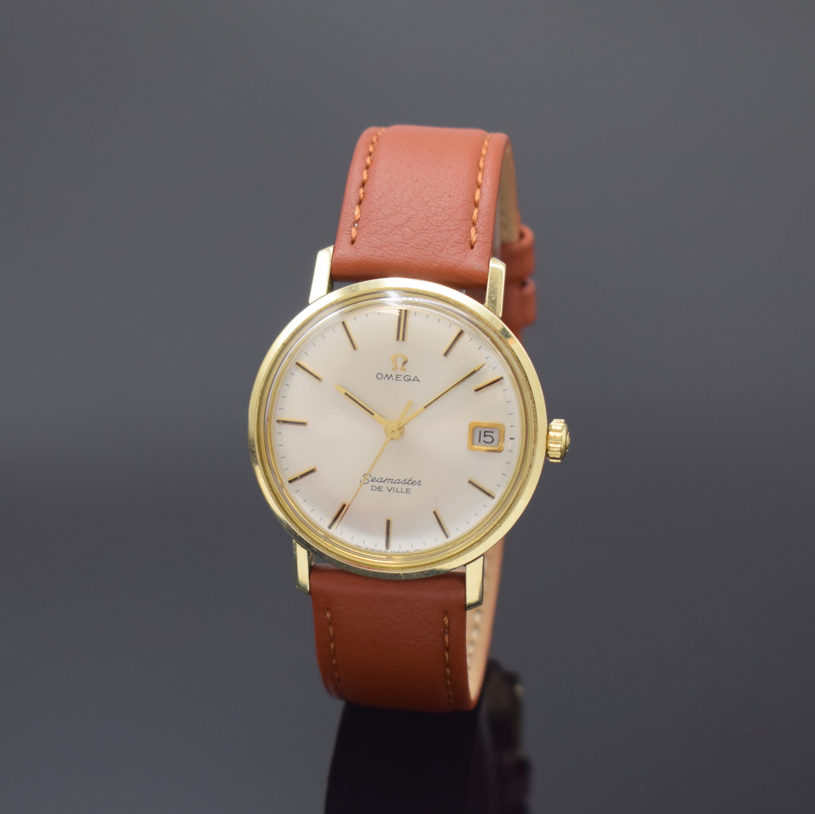 OMEGA Seamaster De Ville Herrenarmbanduhr Referenz 136.020, Schweiz um 1965, Handaufzug, Monocoque-Geh., gedr. Lünette, silb. Zifferbl. m. aufges. ...