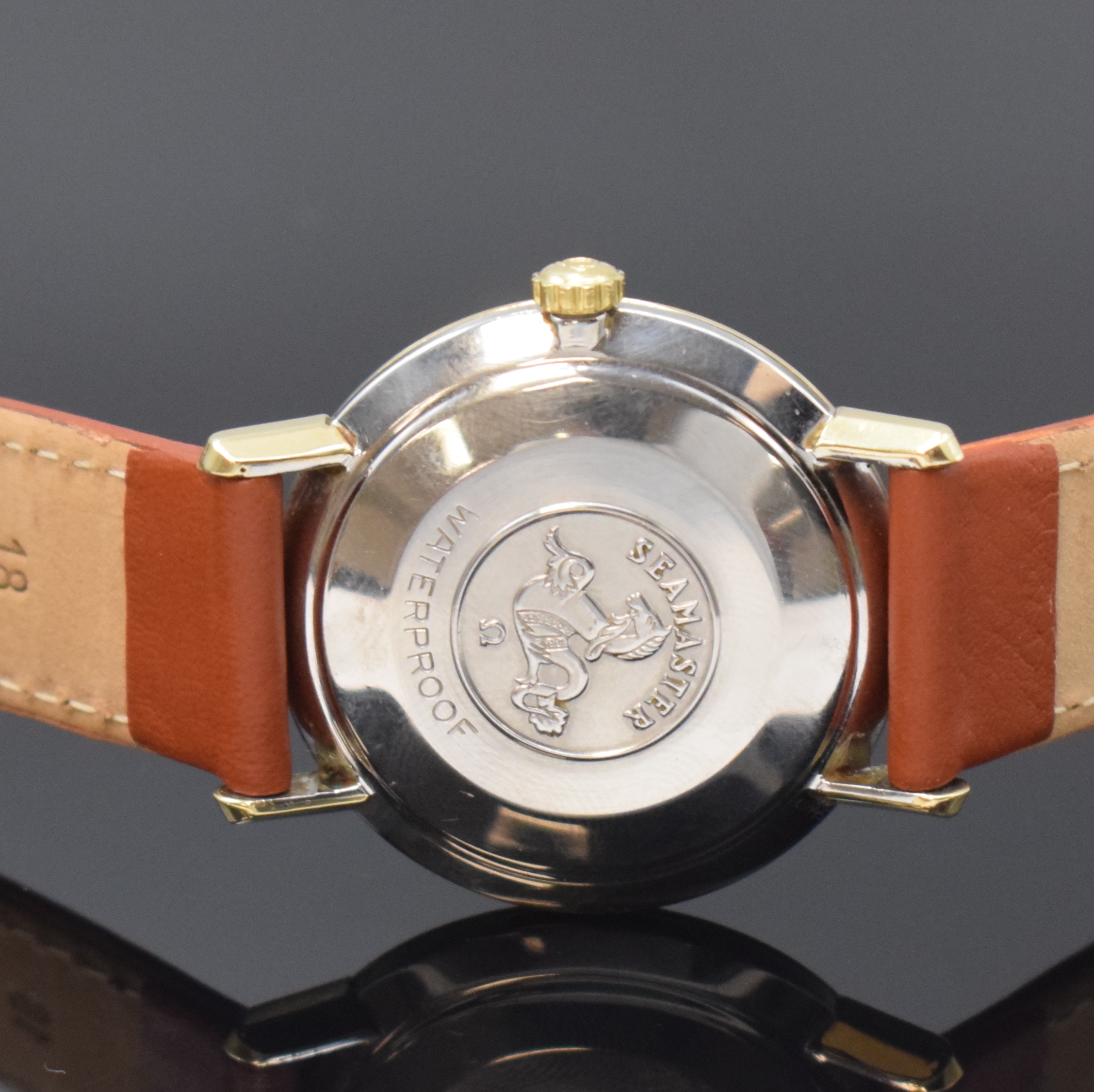 Detail c: OMEGA Seamaster De Ville Herrenarmbanduhr Referenz 136.020, Schweiz um 1965, Handaufzug, Monocoque-Geh., gedr. Lünette, silb. Zifferbl. m. aufges. ...