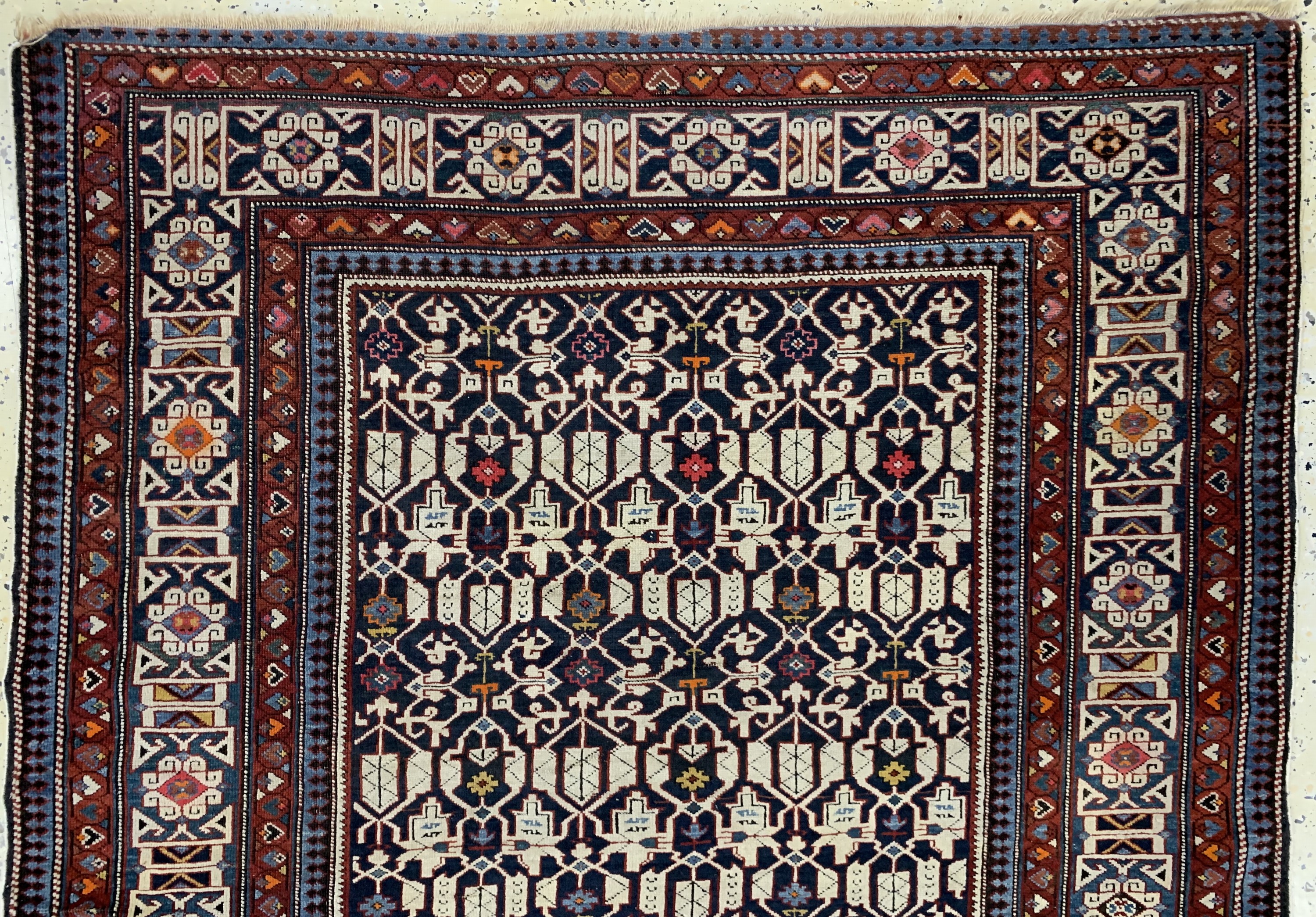 Detail a: "Blattgabel"Schirwan antik, Kaukasus, 19.Jhd, Wolle auf Wolle, ca. 175 x 130 cm, EHZ: 2-3, (restauriert),aus Sammlungsauflösung
