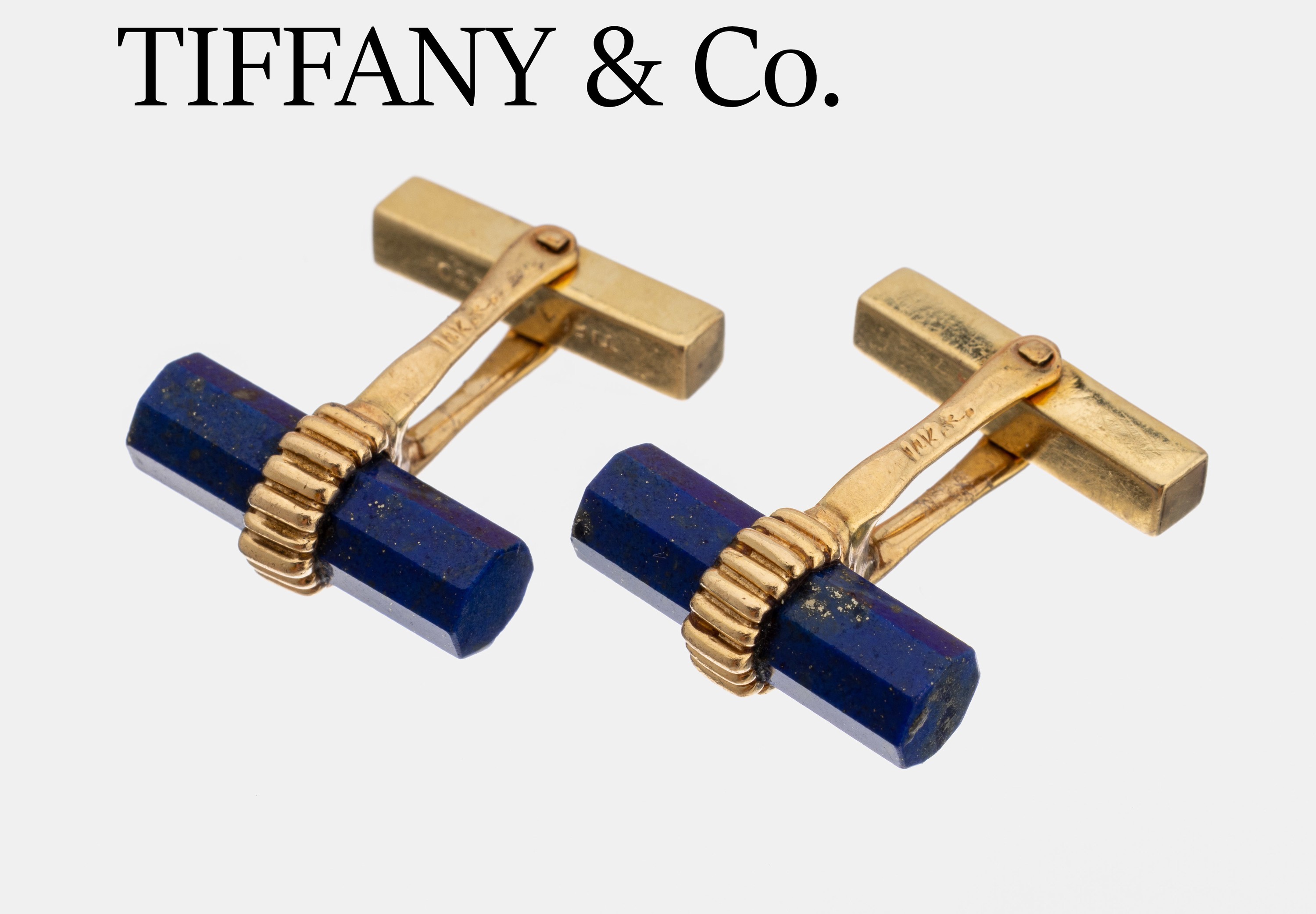 Paar 14 kt Gold TIFFANY & Co. Manschetten - knöpfe, GG 585/000, oktogonale Lapislazulistangen, ca. 11.7 g