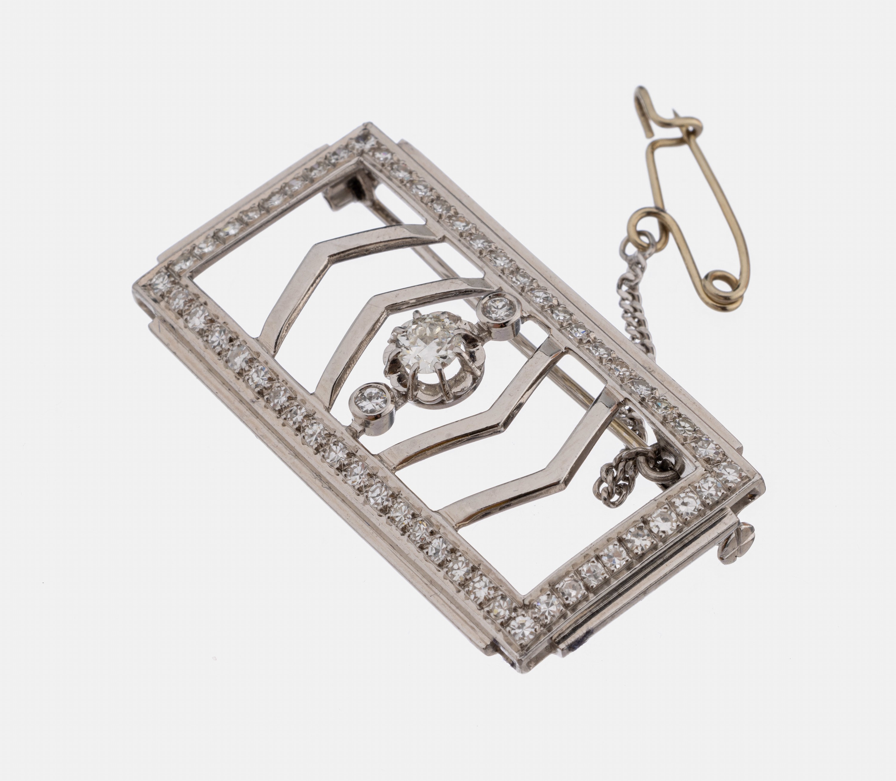 Platin Diamant-Brosche, Pt. 950/000, quadratisch, 3 Brillanten und 56 8/8-Diamantenzus. ca. 1.50 ct Weiß/si, ca. 4.3 x 2.5 cm, mit ...