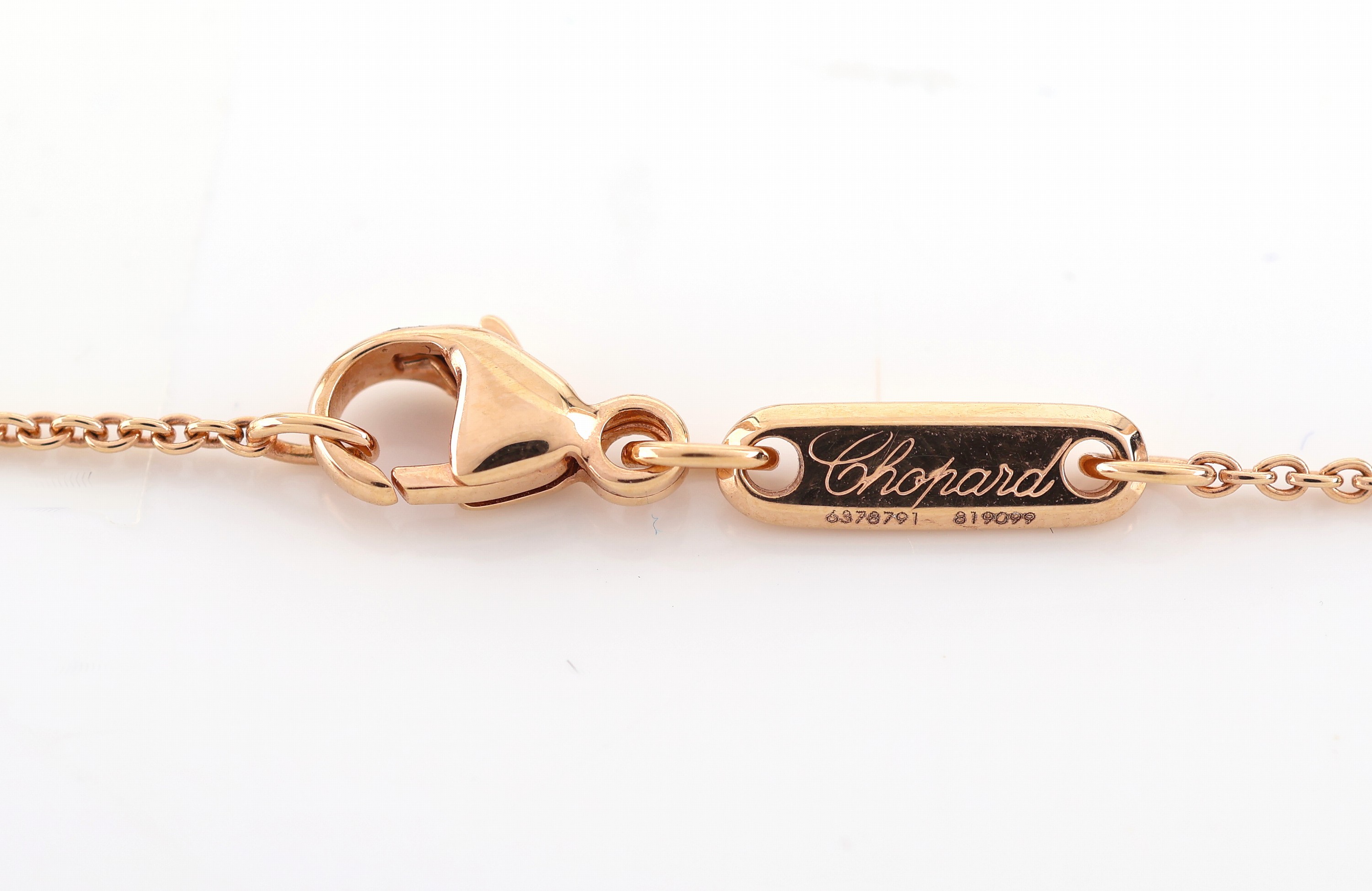 Detail c: 18 kt Gold CHOPARD Collier, RoseG/WG 750/000, verschlungene Ringe, sign., L. ca. 40.5 cm, ca. 6.4 g