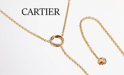 Image 18 kt Gold CARTIER Y-Collier , GG/WG/RG 750/000, Mittelteil mit Trinity Ring, Ende mit ...