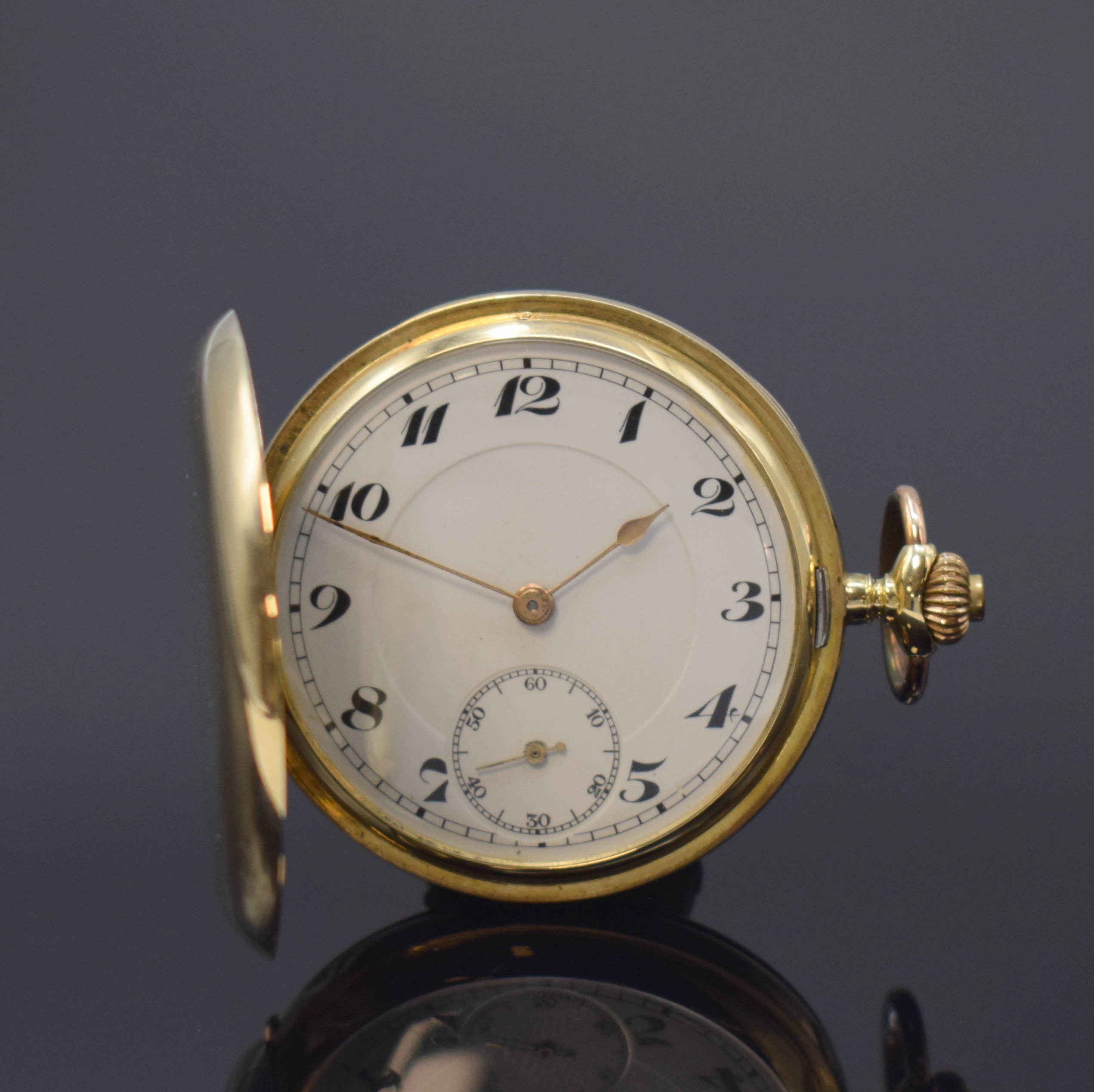 Savonette Taschenuhr in GG 585/000, Schweiz um 1915, glattes Geh. dell., Metallcuvette, Emailzifferbl. m. arab. Zahlen, gold. Zeiger, kl. Sek. b. 6, ...