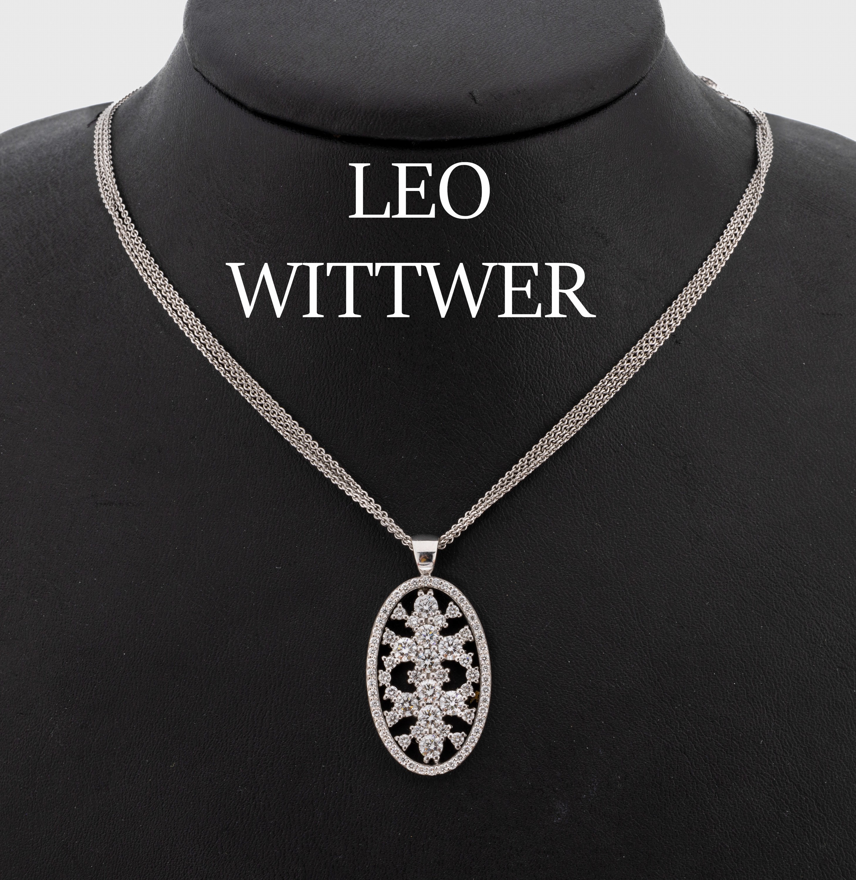 18 kt Gold LEO WITTWER Brillant-Anhänger, WG 750/000, oval, durchbrochen, 75 Brillanten zus. ca. 2.54 ct (grav.) feines Weiß-Weiß/vs- si, an ...