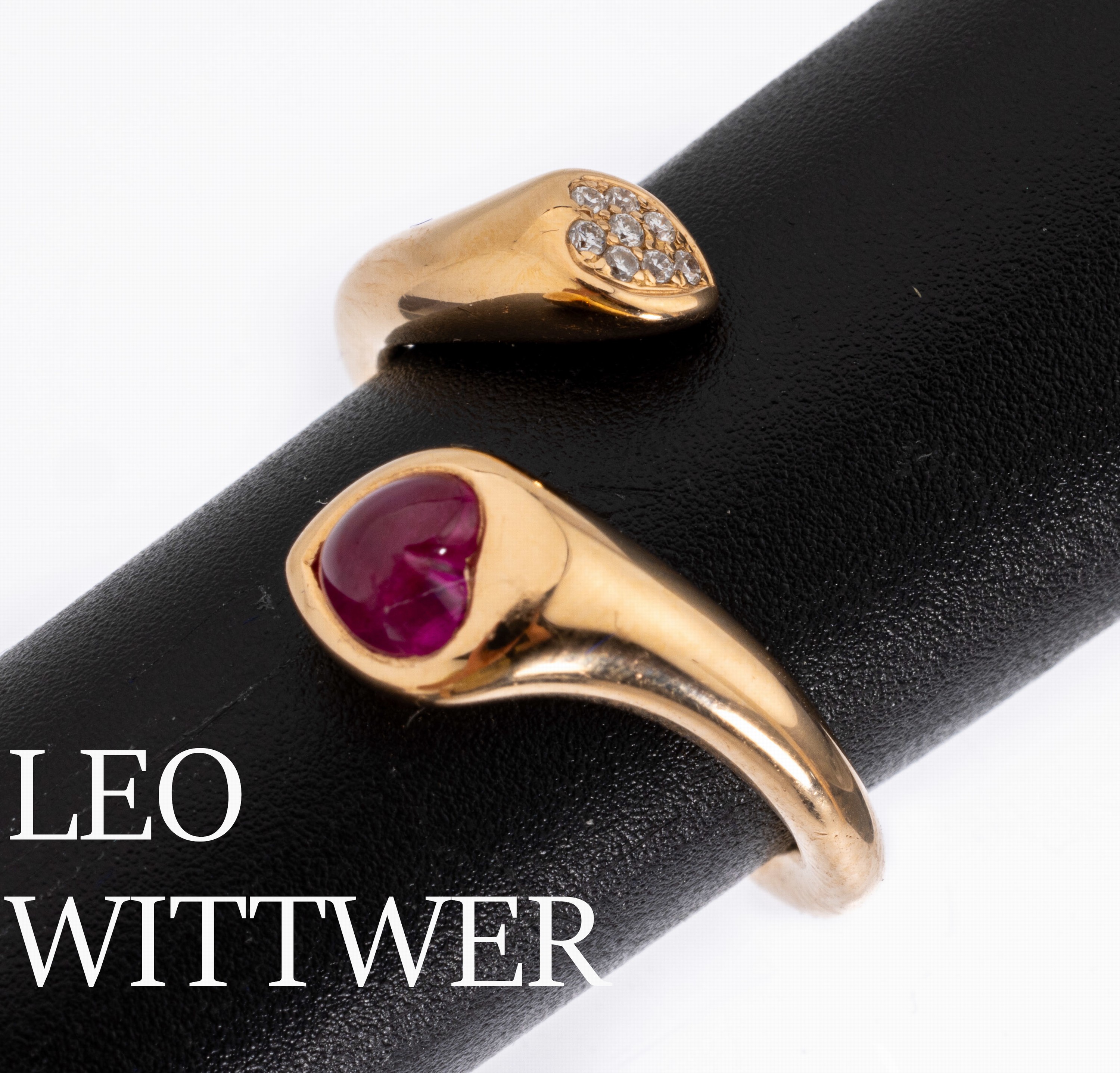 18 kt Gold LEO WITTWER Saphir-Brillant-Ring, GG 750/000, außergewöhnliche Gestaltung, 1 herzf. Pinksaphir ca. 0.10 ct, 8 Brillanten zus. ca. 0.04 ...