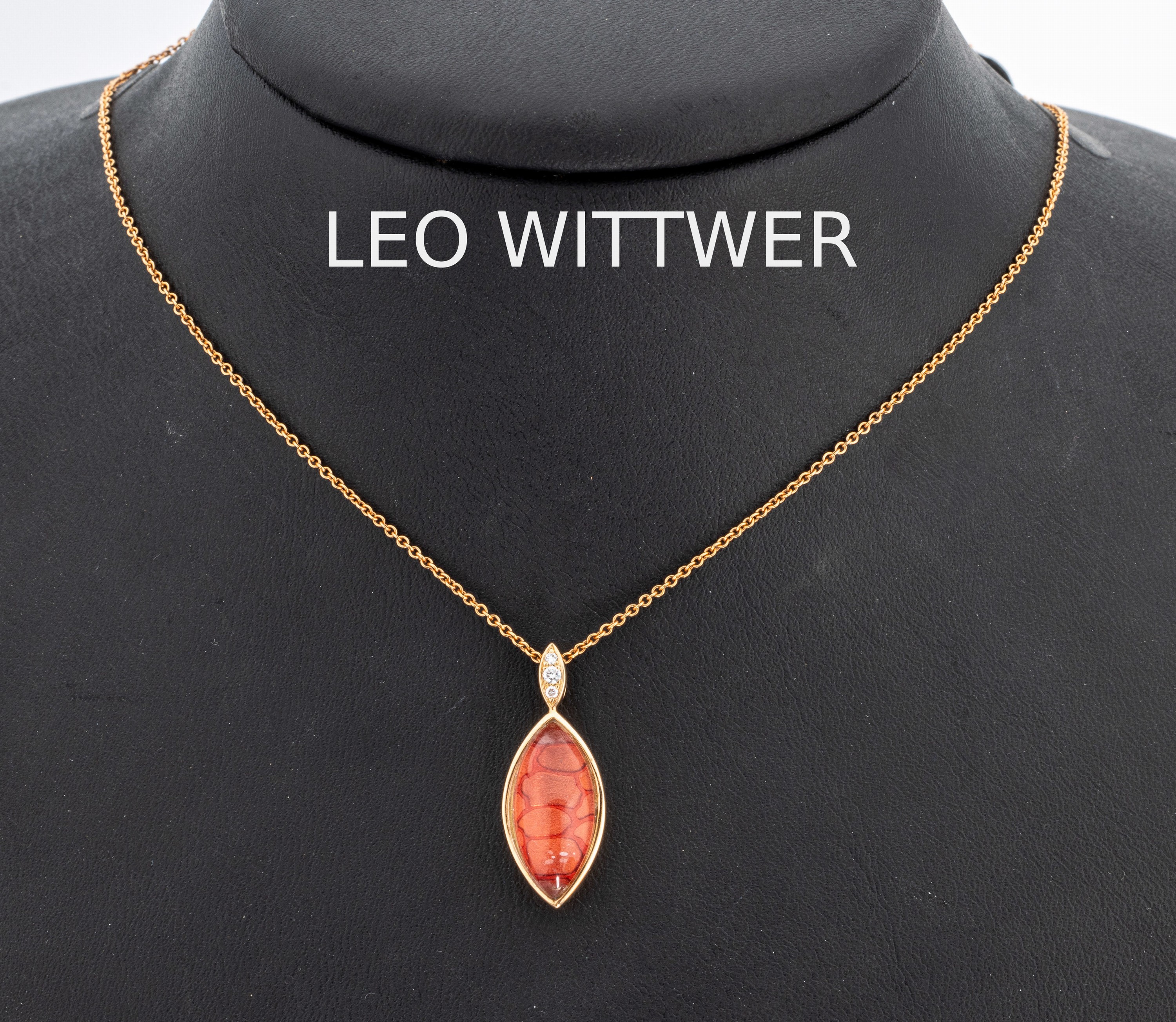 18 kt Gold LEO WITTWER Brillant-Collier, RG750/000, navettef. Mittelteil, folierter Bergkristall, 3 Brillanten zus. ca. 0.03 ct (grav.) Weiß/si, an ...