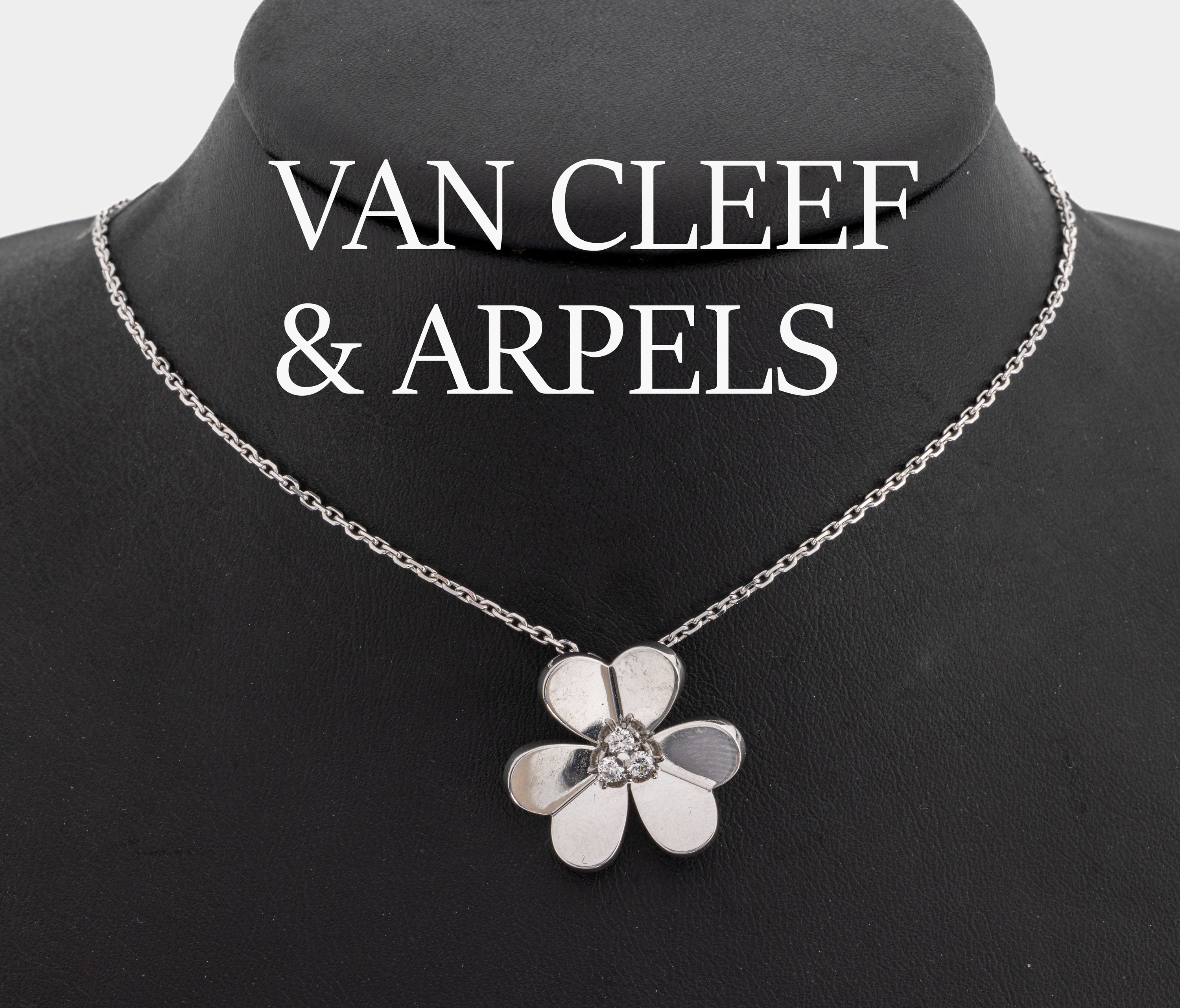 18 kt Gold VAN CLEEF & ARPELS Brillant Collier "Blüte", WG 750/000, mittig 3 Brillanten zus. ca. 0.15 ct feines Weiß/vs, L.ca. 37 oder ...