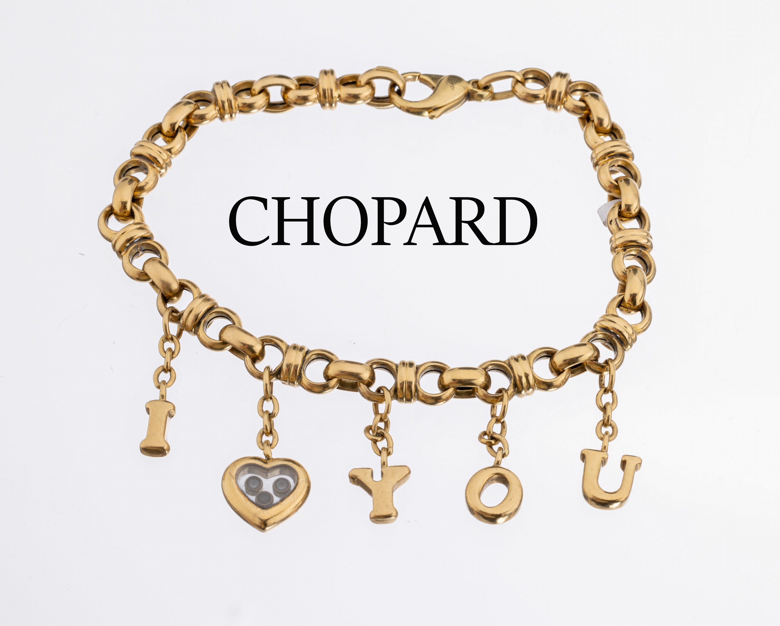 18 kt Gold CHOPARD Brillant-Armband "Happy Diamonds", GG 750/000, Abhängungen I love YO U, Herz mit bewegl. Brillanten hinter Glas, ...
