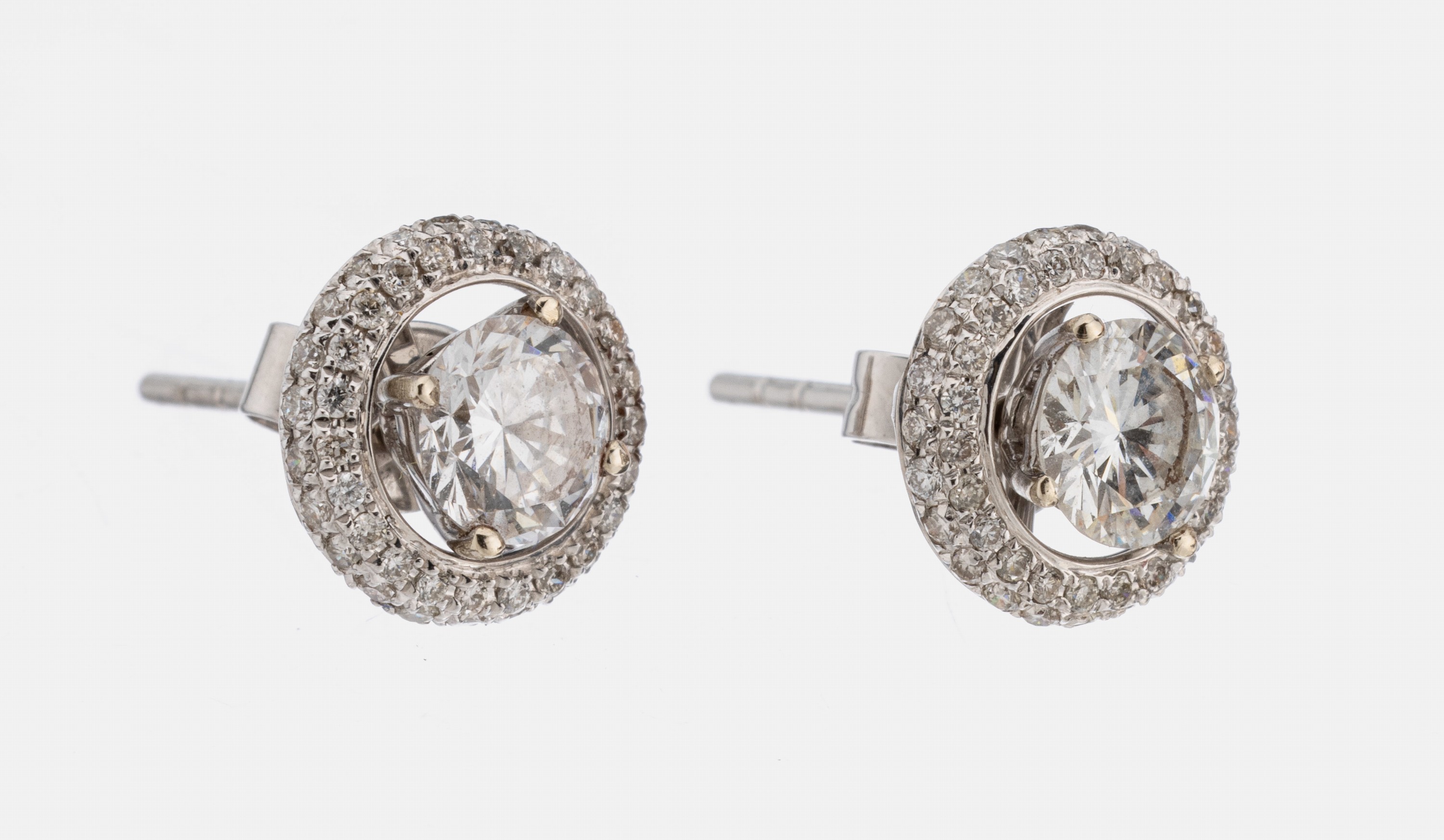 Paar 18 kt Gold Brillant-Ohrstecker, WG 750/000, 2 Brillanten zus. ca. 0.90 ct Weiß/si, abnehmbare Kränze mit Brillanten zus.ca. 0.33 ct Weiß/si
