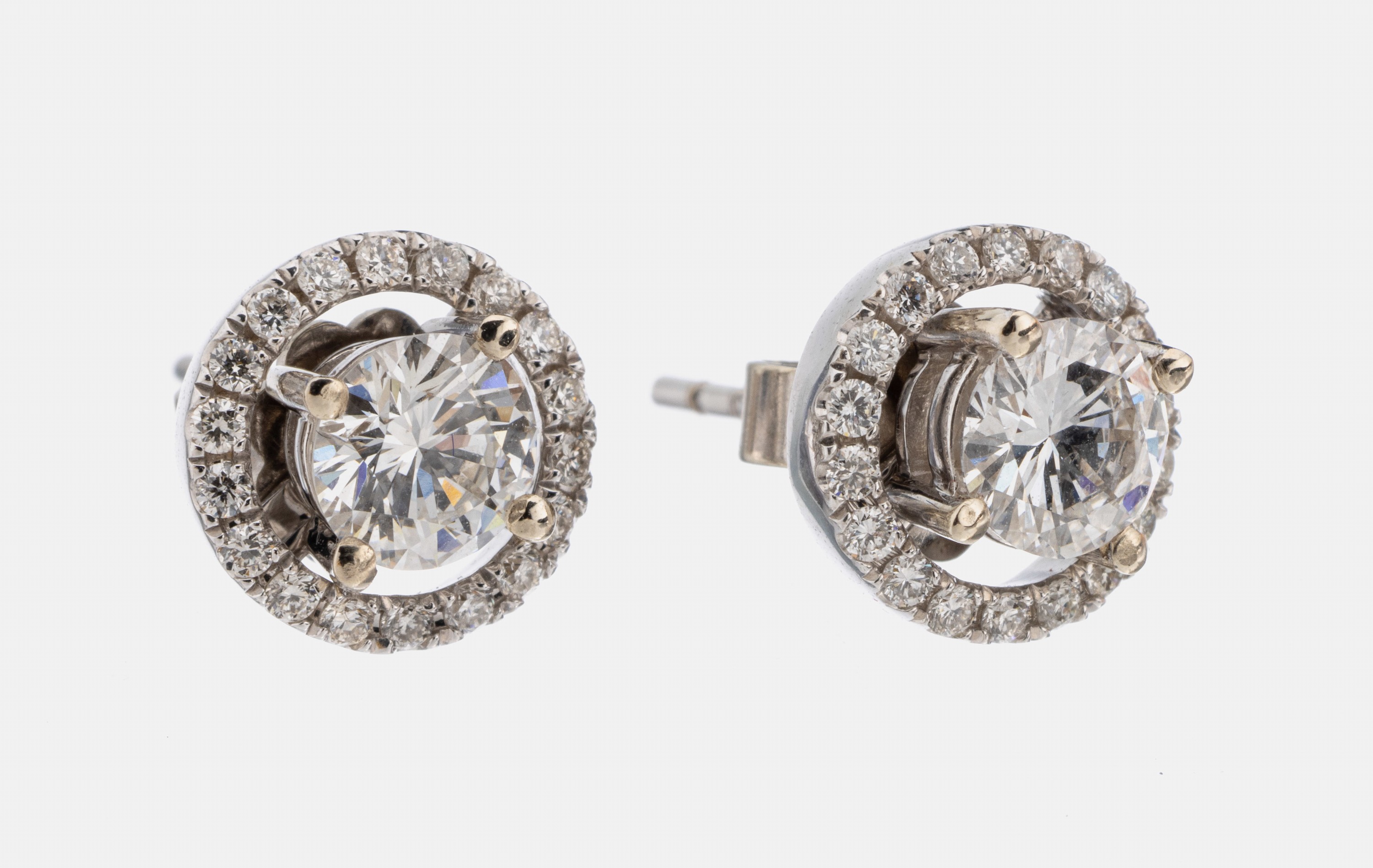 Paar 18 kt Gold Brillant-Ohrstecker, WG 750/000, 2 Brillanten zus. ca. 1.04 ct Weiß/si, abnehmbare Kränze mit Brillanten zus.ca. 0.30 ct Weiß/si