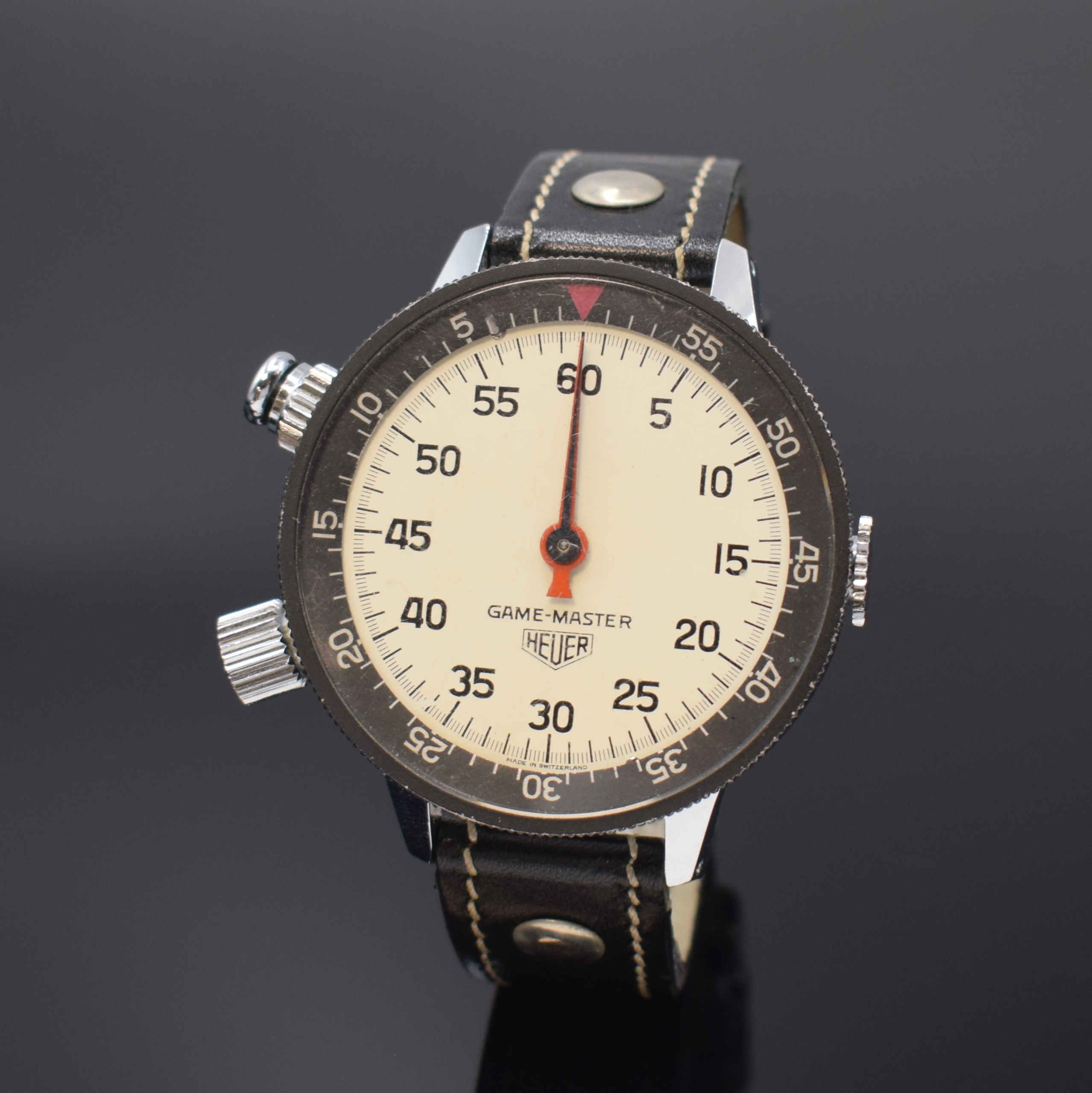 HEUER Game-Master Armbandstoppuhr, Handaufzug, Schweiz um 1960, verchr. Geh. m. aufgedr. Stahlboden, beids. drehb. Lünette m. 60er Teilung ...