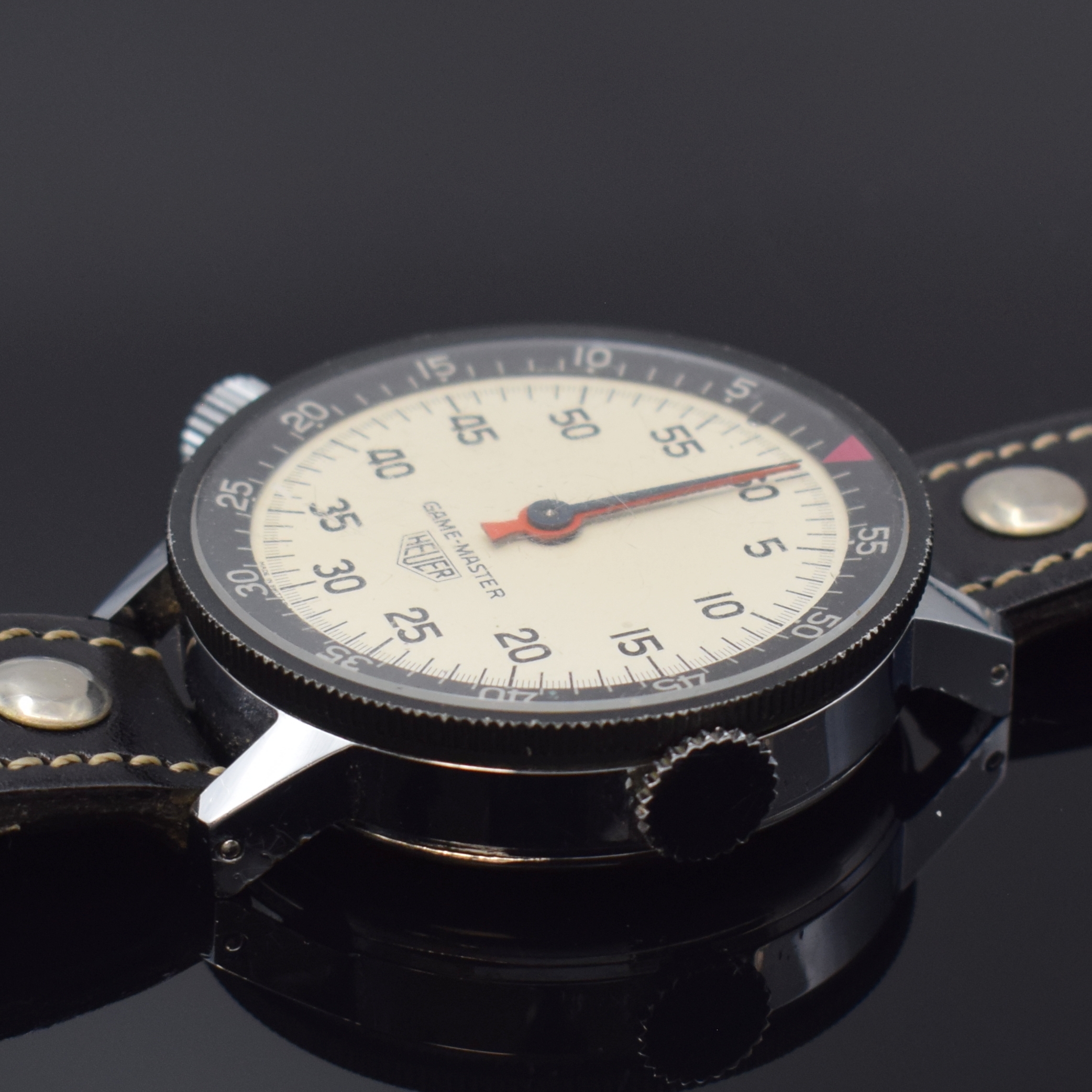 Detail c: HEUER Game-Master Armbandstoppuhr, Handaufzug, Schweiz um 1960, verchr. Geh. m. aufgedr. Stahlboden, beids. drehb. Lünette m. 60er Teilung ...