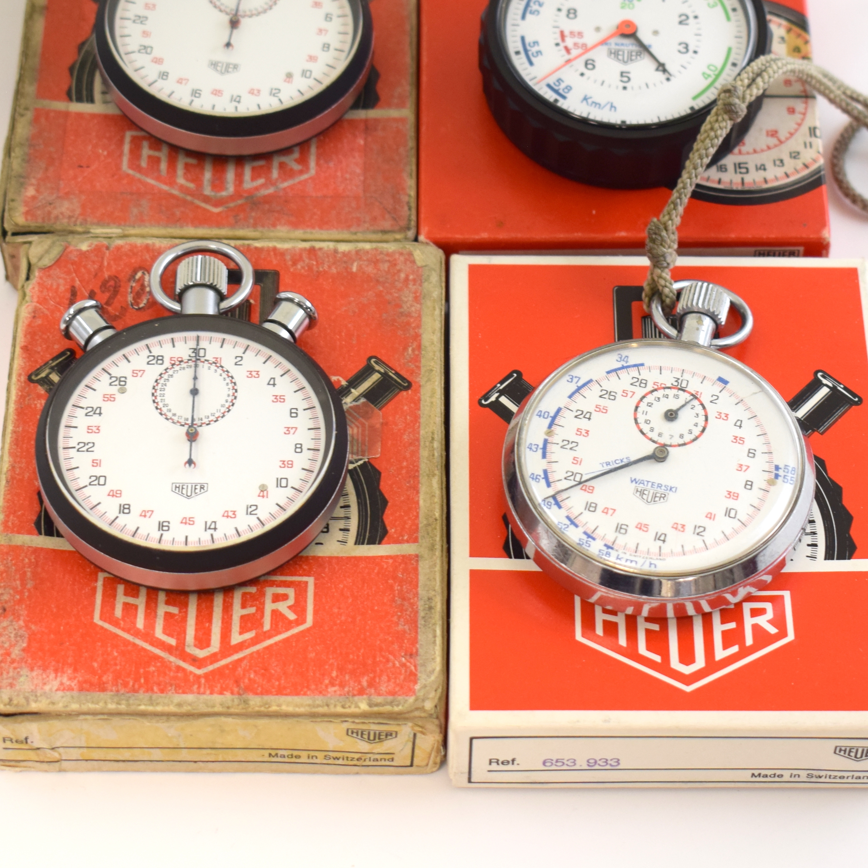 Detail b: HEUER 4 Stoppuhren in original Box, Schweiz um 1960/1970, Geh. m. aufgedr. Böden, 3 x verchr., 1 x Fiberglass, 2 x Rattrapante Kal. Valjoux 57 m. ...