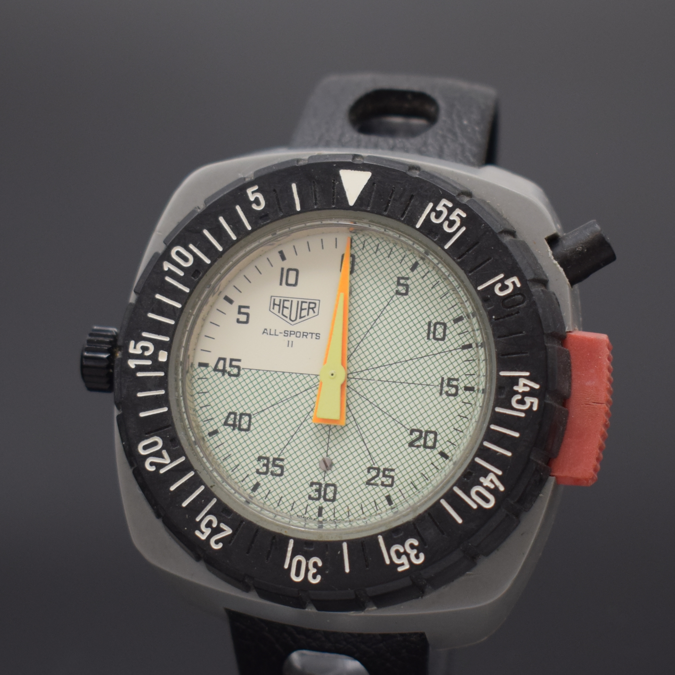 Detail a: HEUER All-Sports II Armband-Stoppuhr Referenz 775.907M, Handaufzug, Schweiz um 1976, Polymer-Geh., 60 Sek. und 60 Min. Stoppzähler, 2-farb. ...