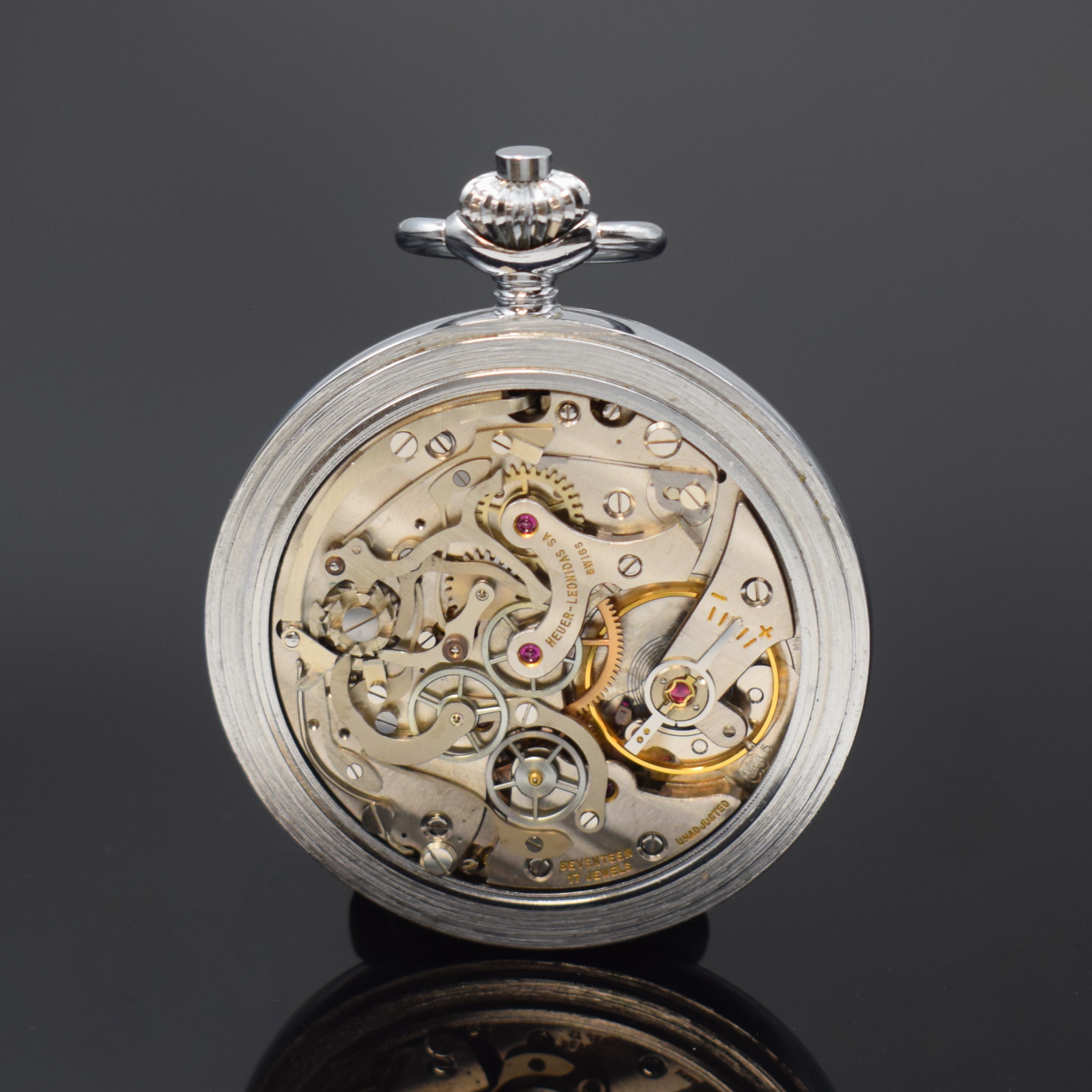 Detail c: HEUER Taschenuhr-Schaltradchronograph, Handaufzug, Schweiz um 1950, verchr. Metallgeh., Boden, Glasrand und Cuv. aufgedr., emailfarb. Zifferblatt mit ...