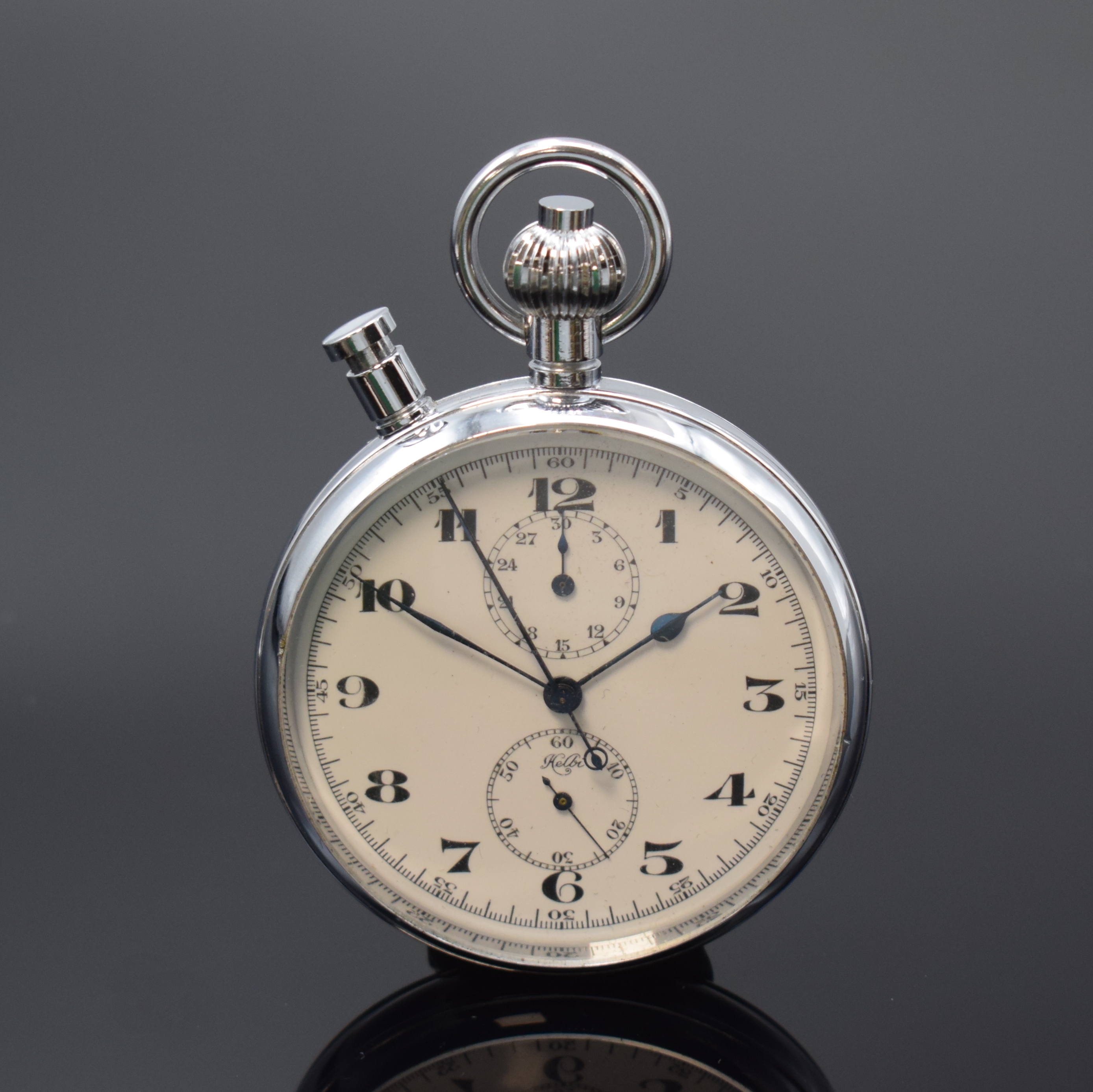 HELBI Taschenuhr mit Chronograph Rattrapante, Handaufzug, Schweiz um 1950, verchr. gedr. Geh., Emailzifferblatt m. 1/10 Sek. Außenskala, ...