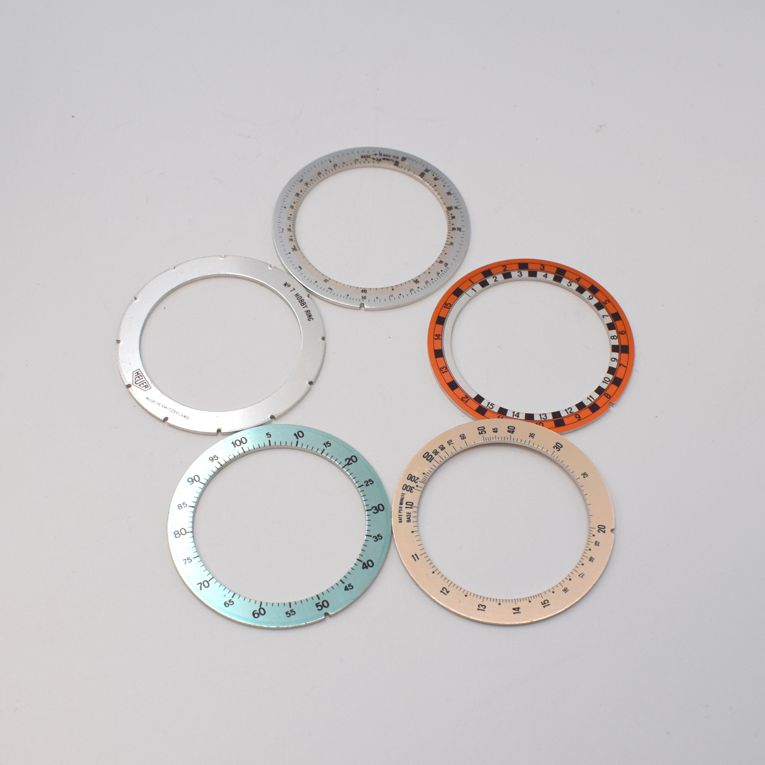 Detail b: HEUER Set von 5 Stoppuhren und 5 Ring-Master Lünetten, 4 Einhandstoppuhren: Typ Super Track im verchromten Geh., D. ca. 53 mm, Typ All-Sports matt ...