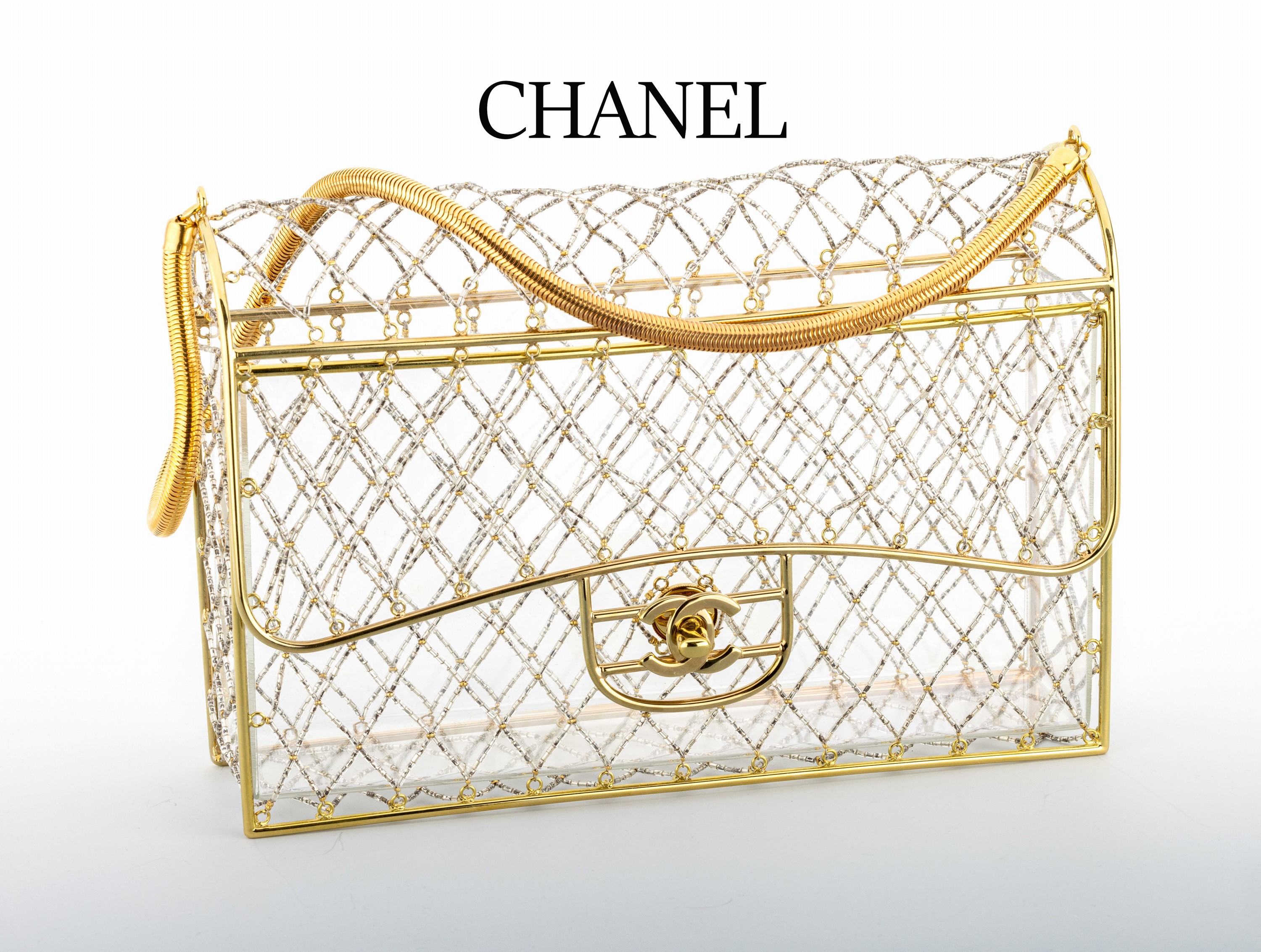 CHANEL Cage Flap Bag, Paris 1990er Jahre, Goldfarbene Hardware, gold- und silberfarbenesGeflecht, durchsichtiger Plexiglaseinsatz, Verschluß mit ...