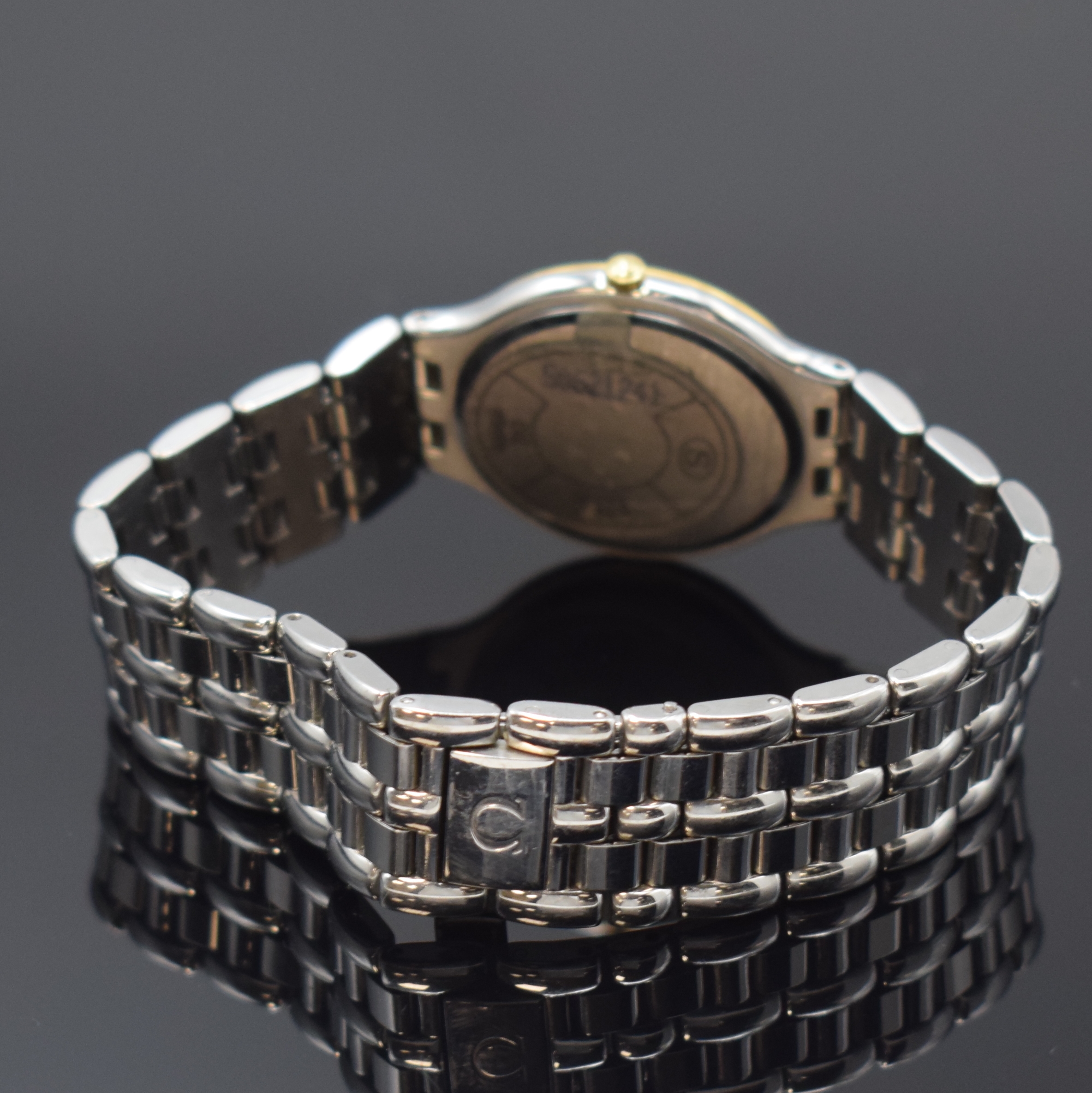 Detail b: OMEGA De Ville Armbanduhr in Stahl/Gold Referenz 196.0316, Schweiz um 2000, quarz, Boden aufgedr., orig. Gliederband m. Faltschl., weißes Zifferbl. ...