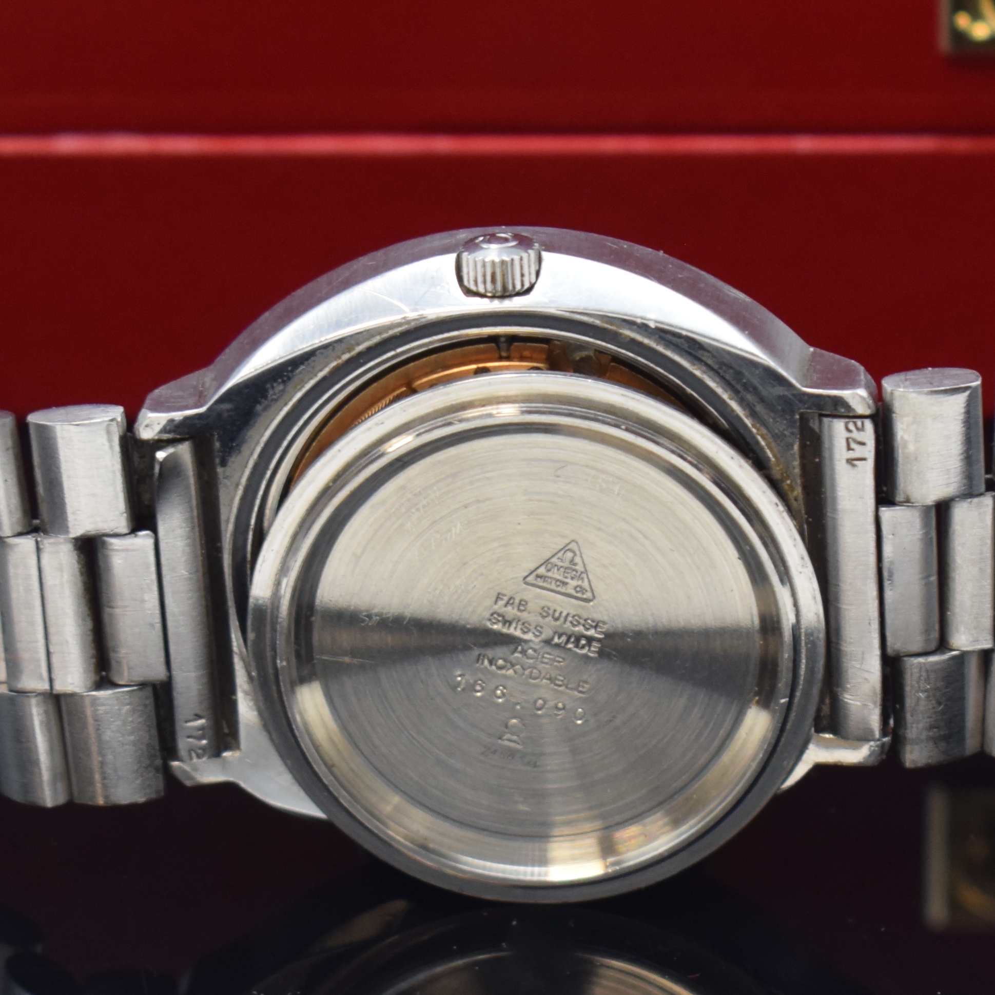 Detail g: OMEGA Herrenarmbanduhr Modell Seamaster Referenz 166.090, Automatik, Schweiz um 1971, mass. Edelstahlgeh. inkl. orig. Gliederband Ref. 1162, Boden m. ...