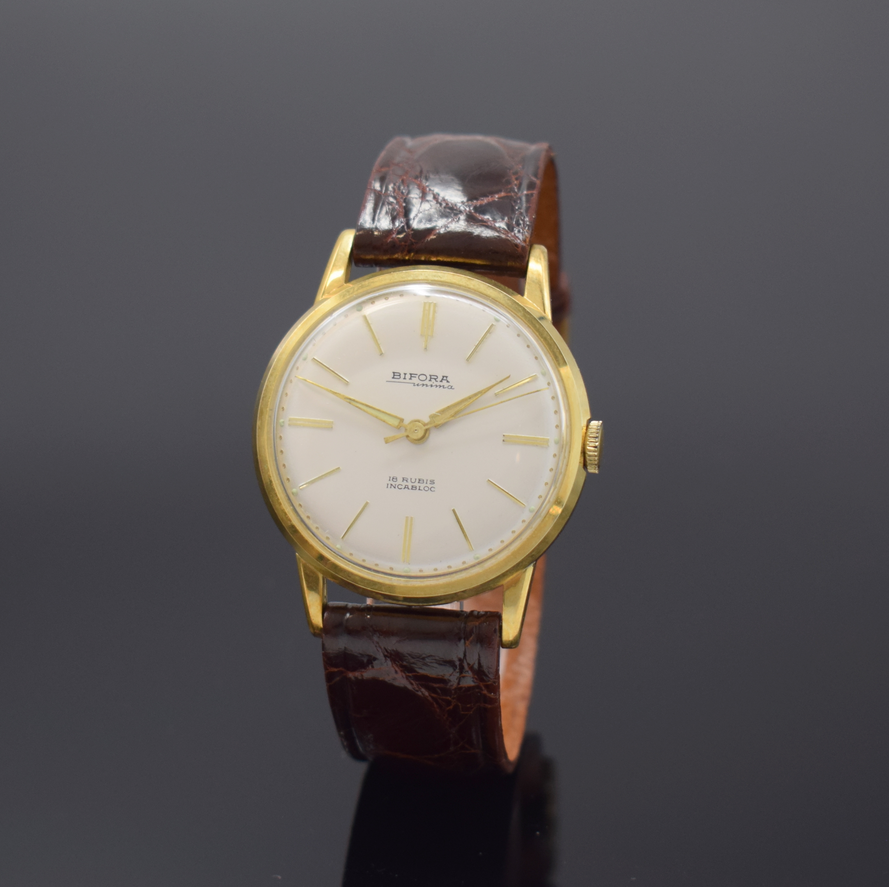 BIFORA Unima Kaliber 120 seltene Armbanduhr in GG 585/000, Deutschland um 1955, Handaufzug, gedr. Boden, silb. Zifferbl., gold. Indizes, gold. ...
