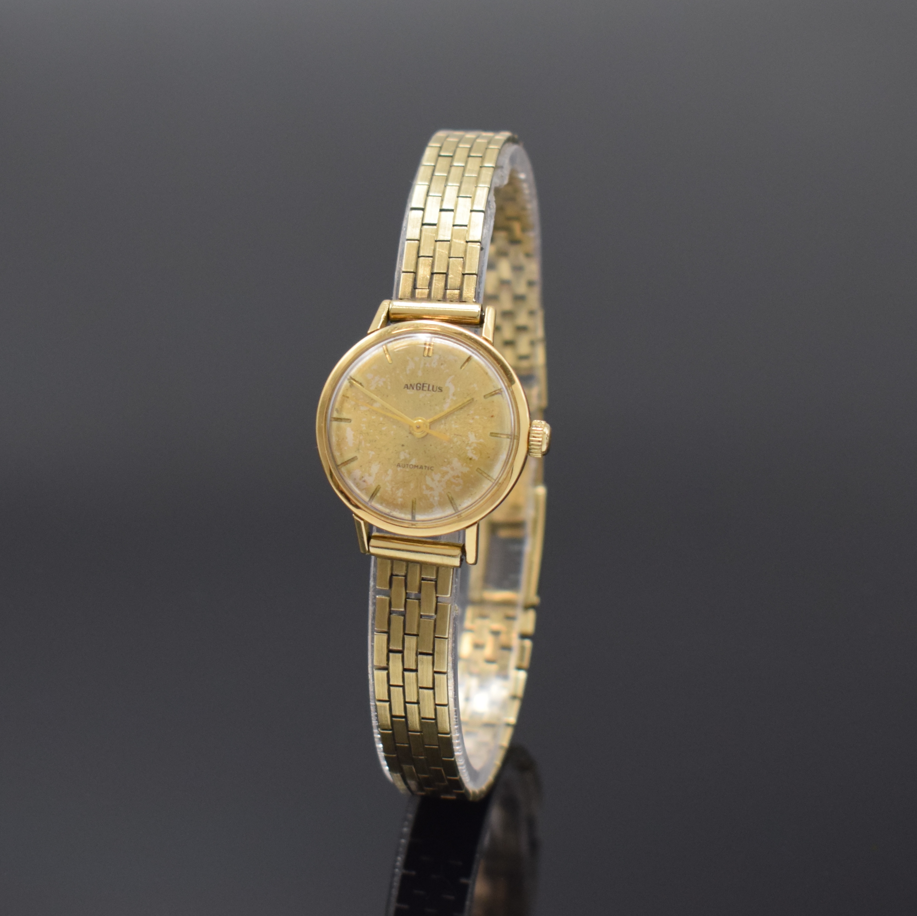 ANGELUS Damenarmbanduhr in GG 750/000 am neutralen GG 333/000 Band, Automatik, Schweiz um 1960, 3-teil. Geh., Boden und Glasrand aufgedr., Zifferbl. ...