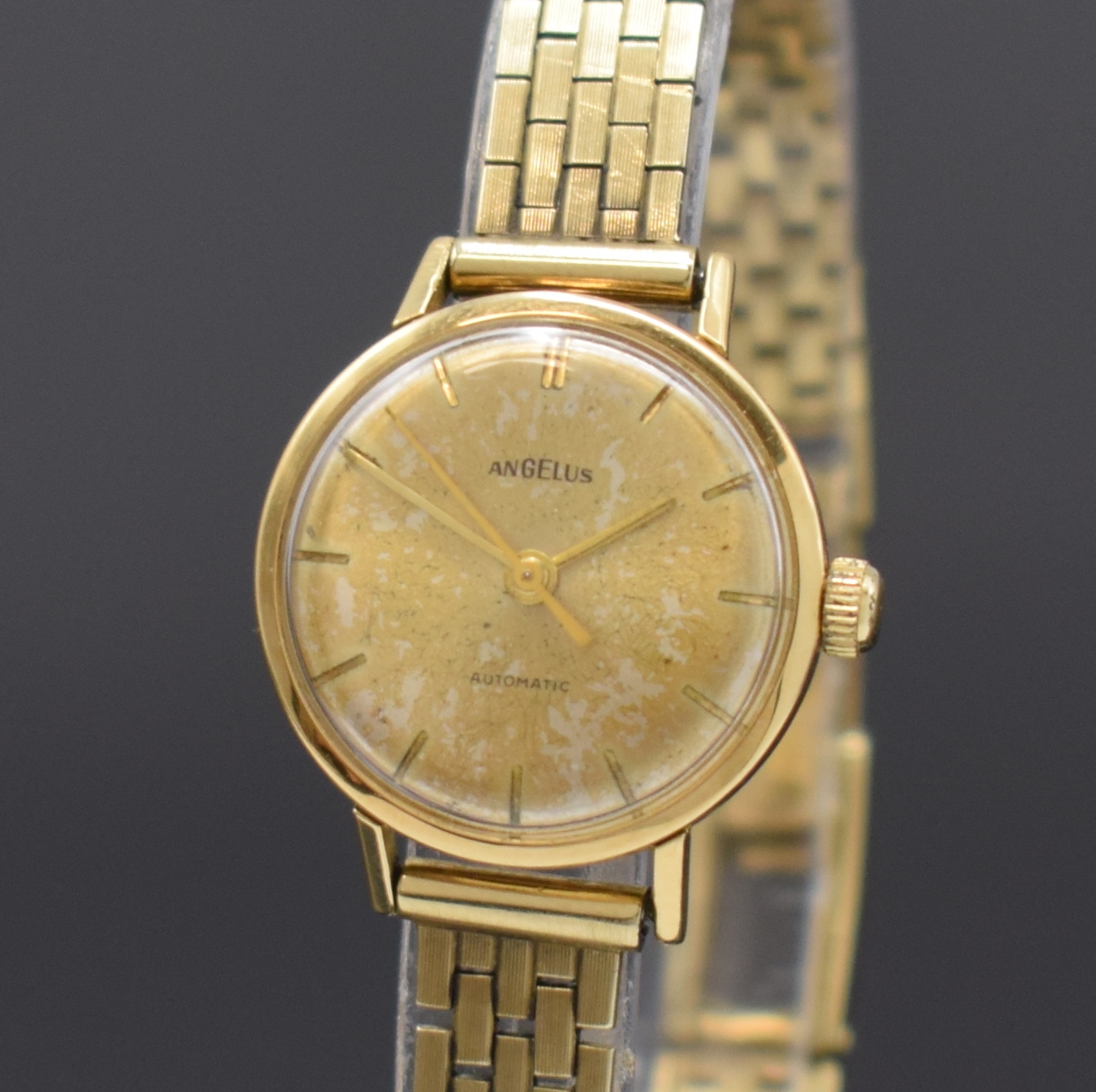 Detail a: ANGELUS Damenarmbanduhr in GG 750/000 am neutralen GG 333/000 Band, Automatik, Schweiz um 1960, 3-teil. Geh., Boden und Glasrand aufgedr., Zifferbl. ...