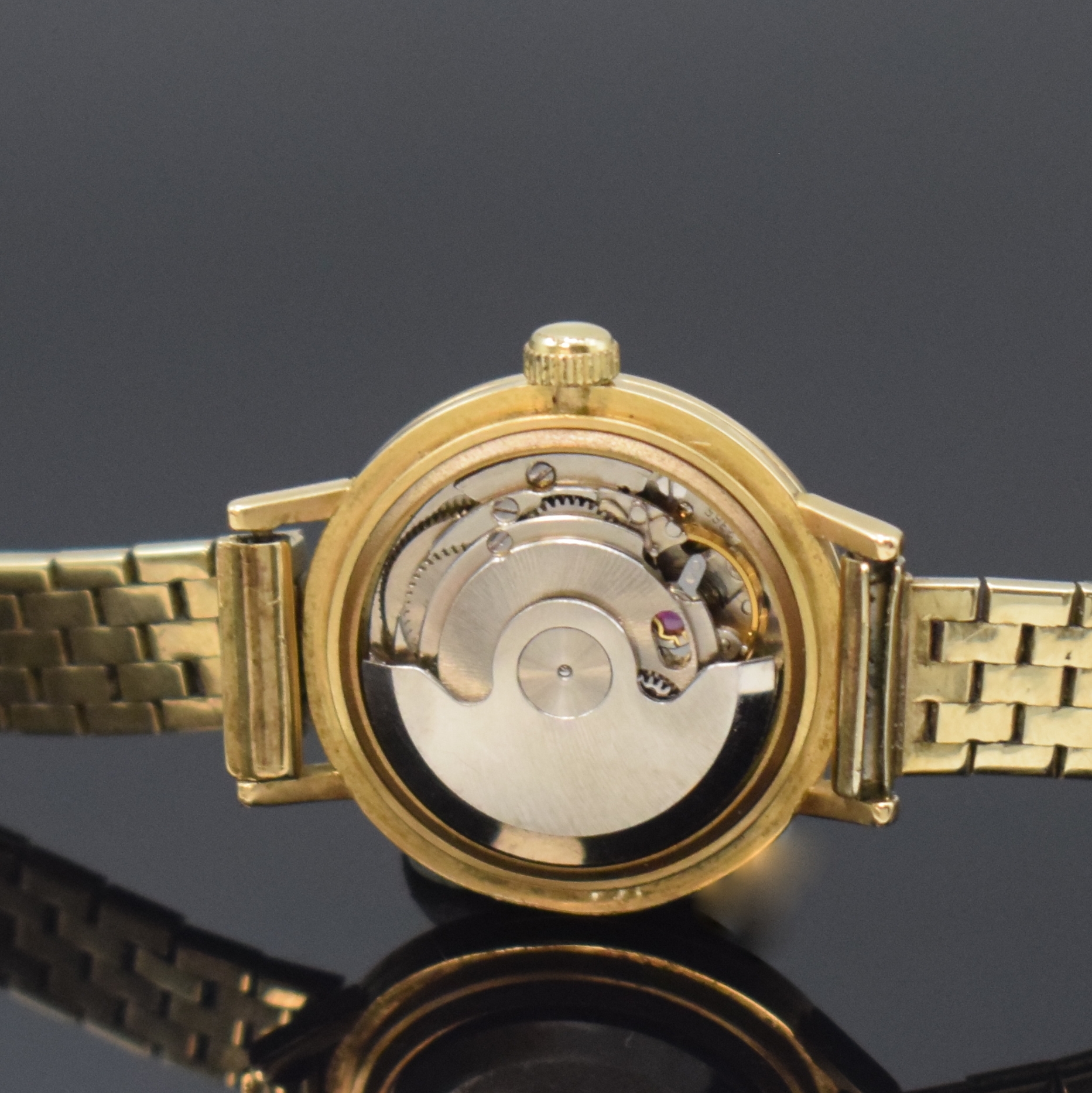 Detail d: ANGELUS Damenarmbanduhr in GG 750/000 am neutralen GG 333/000 Band, Automatik, Schweiz um 1960, 3-teil. Geh., Boden und Glasrand aufgedr., Zifferbl. ...