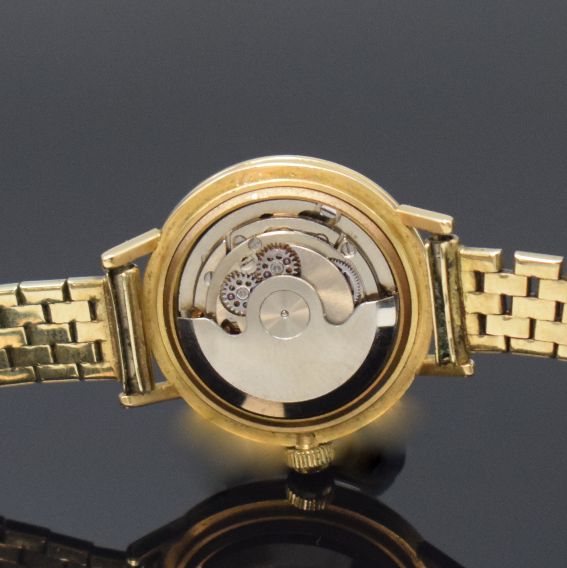 Detail e: ANGELUS Damenarmbanduhr in GG 750/000 am neutralen GG 333/000 Band, Automatik, Schweiz um 1960, 3-teil. Geh., Boden und Glasrand aufgedr., Zifferbl. ...