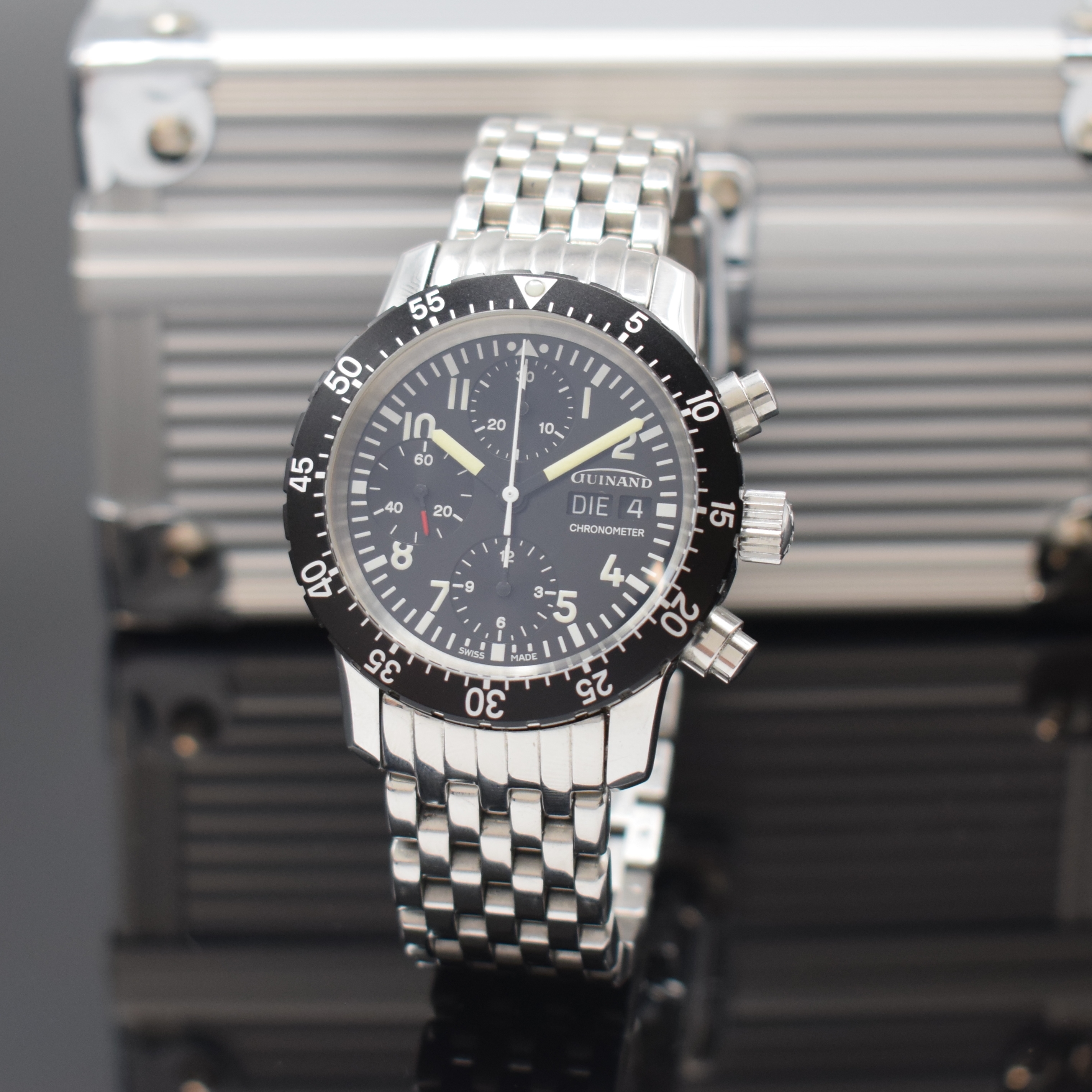 GUINAND Chronometer Herrenchronograph, Schweiz 2010, Automatik, Edelstahlgeh. inkl. neutr. Gliederband m. dopp. Faltschl., beids. vergl., Boden u. ...