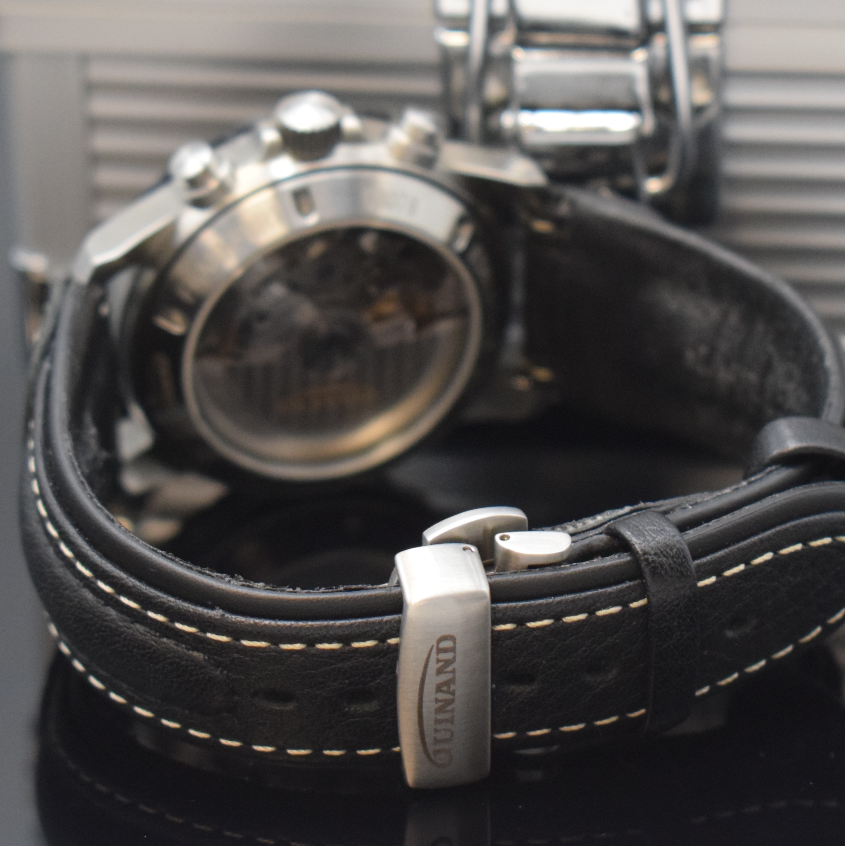 Detail b: GUINAND Herrenchronograph in Edelstahl, Deutschland/Schweiz 2000, Automatik, neutr. Lederband m. dopp. Faltschl., beids. vergl., Boden u. Krone ...