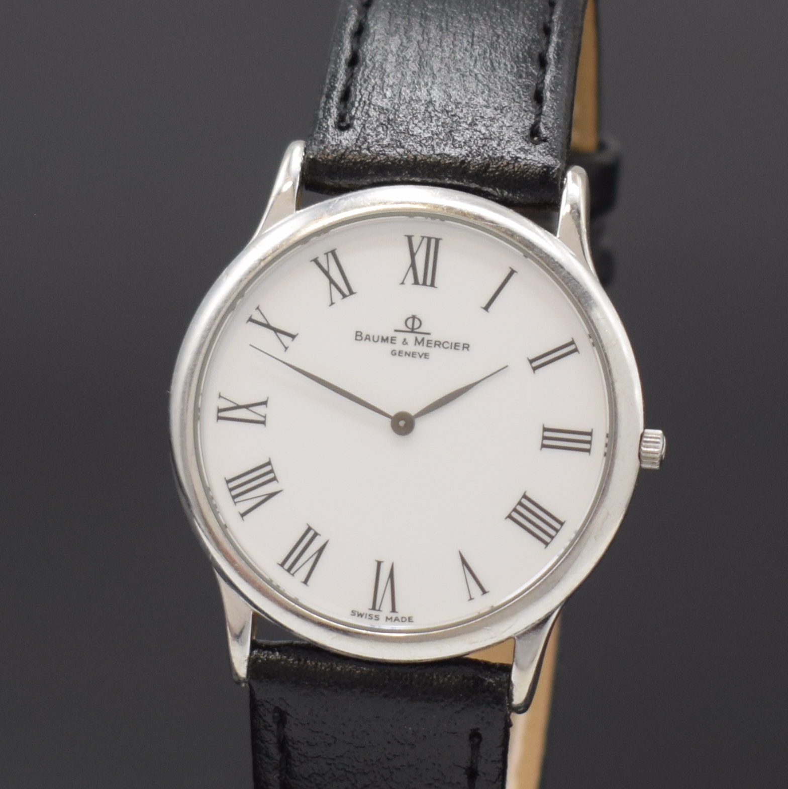 Detail a: BAUME & MERCIER Classima Armbanduhr in WG 750/000 an Referenz MV045200, Schweiz um 2000, quarz, Boden aufgedr., weißes Zifferbl. m. röm. Zahlen, ...