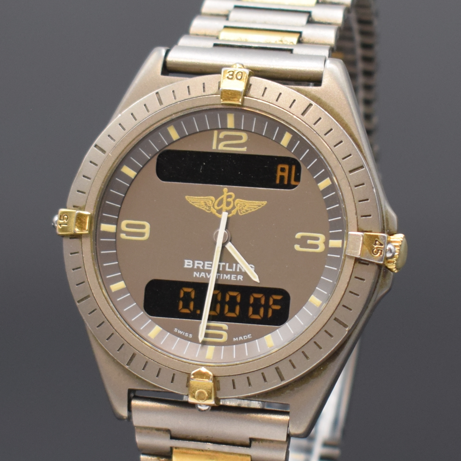 Detail b: BREITLING Herrenarmbanduhr Navitimer Aerospace mit Multifunktionsanzeige Reference 80360, Schweiz um 1995, Titangeh. inkl. Gliederband m. Faltschl., ...