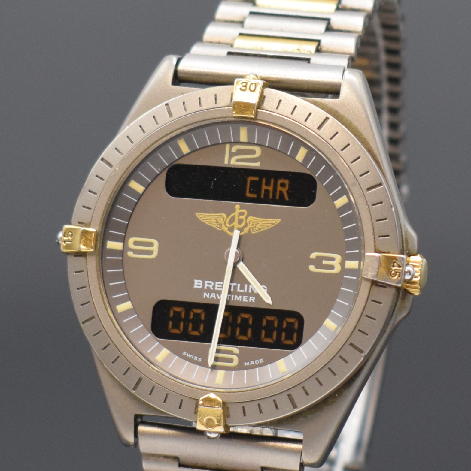 Detail c: BREITLING Herrenarmbanduhr Navitimer Aerospace mit Multifunktionsanzeige Reference 80360, Schweiz um 1995, Titangeh. inkl. Gliederband m. Faltschl., ...
