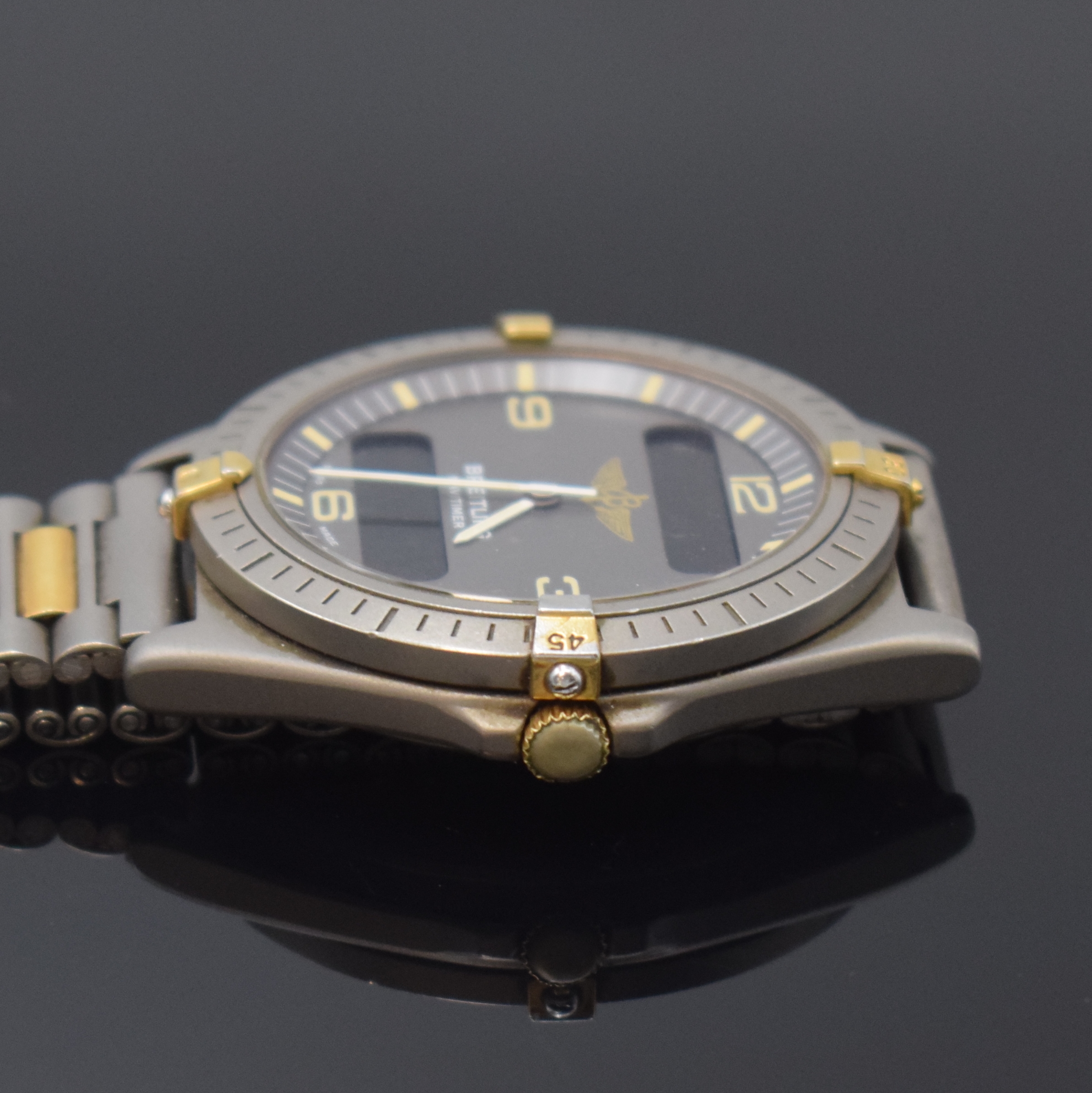 Detail e: BREITLING Herrenarmbanduhr Navitimer Aerospace mit Multifunktionsanzeige Reference 80360, Schweiz um 1995, Titangeh. inkl. Gliederband m. Faltschl., ...