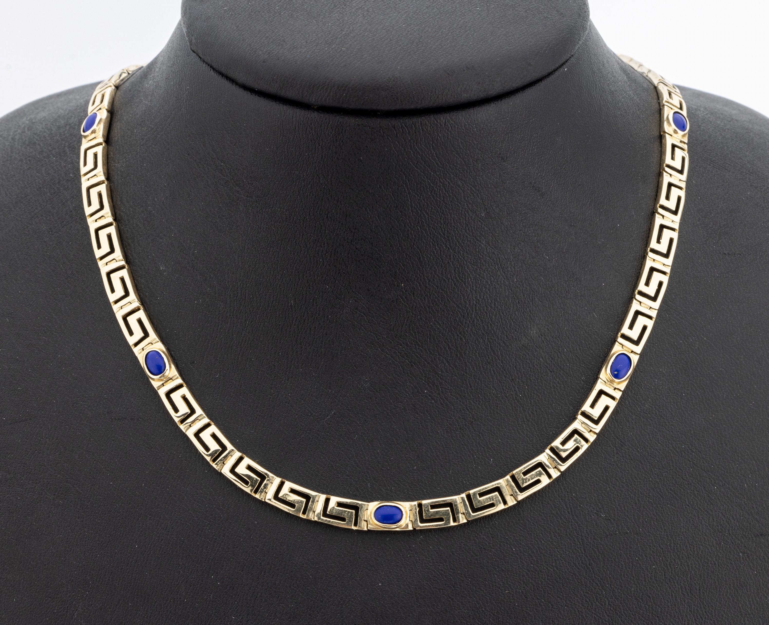 14 kt Gold Lapislazuli-Collier, GG 585/000,Mäandermuster, 7 Zwischenglieder mit Lapislazuli-Cabochons, L. ca. 45 cm, Kastenschloss mit ...