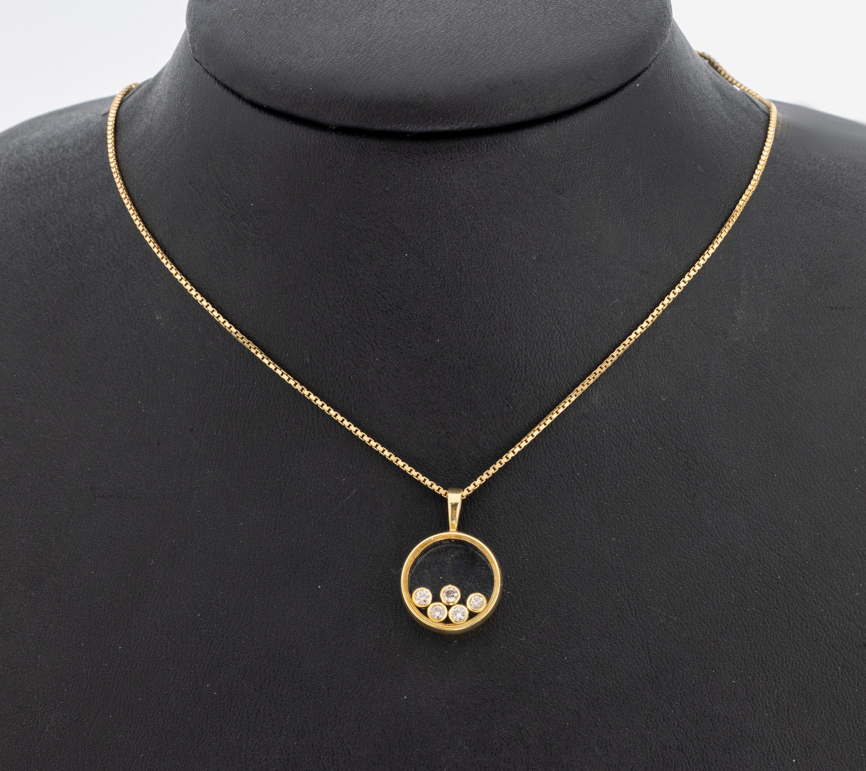 18 kt Gold Brillant-Anhänger, GG 750/000, 5bewegliche Brillanten hinter Glas zus. ca. 0.25 ct Weiß/si, an Kette 14 kt Gold/GG 585/000, L. ca. 40 ...
