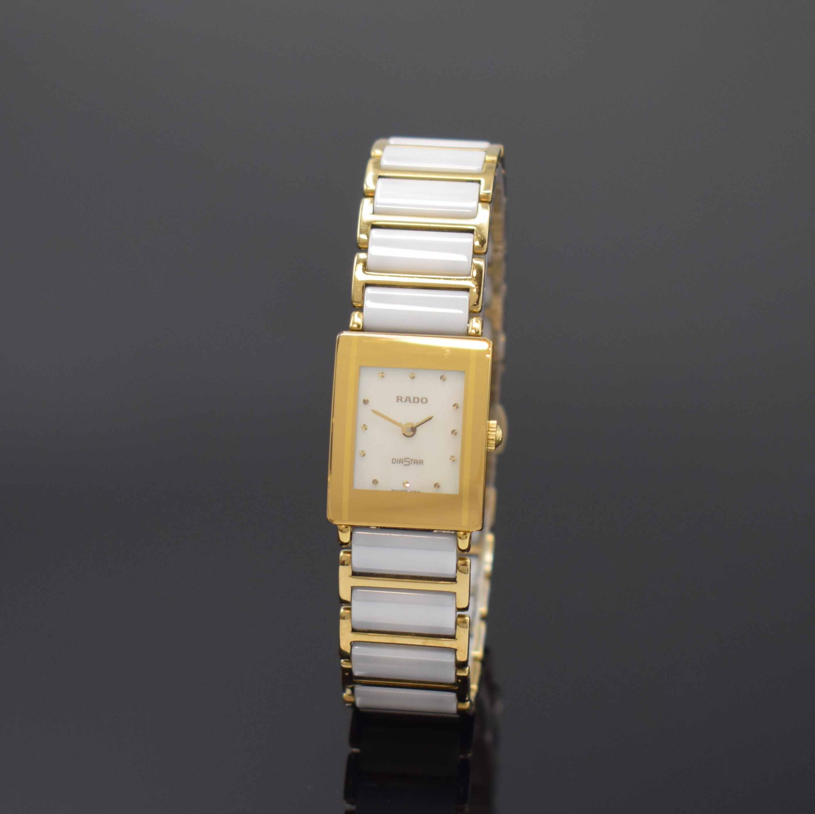 RADO Diastar Damenarmbanduhr Keramik/vergoldet Referenz 153.0283.3N, Schweiz um 2000, quarz, vergold., rechteck. Geh. m. gebogenem Saphirglas, ...