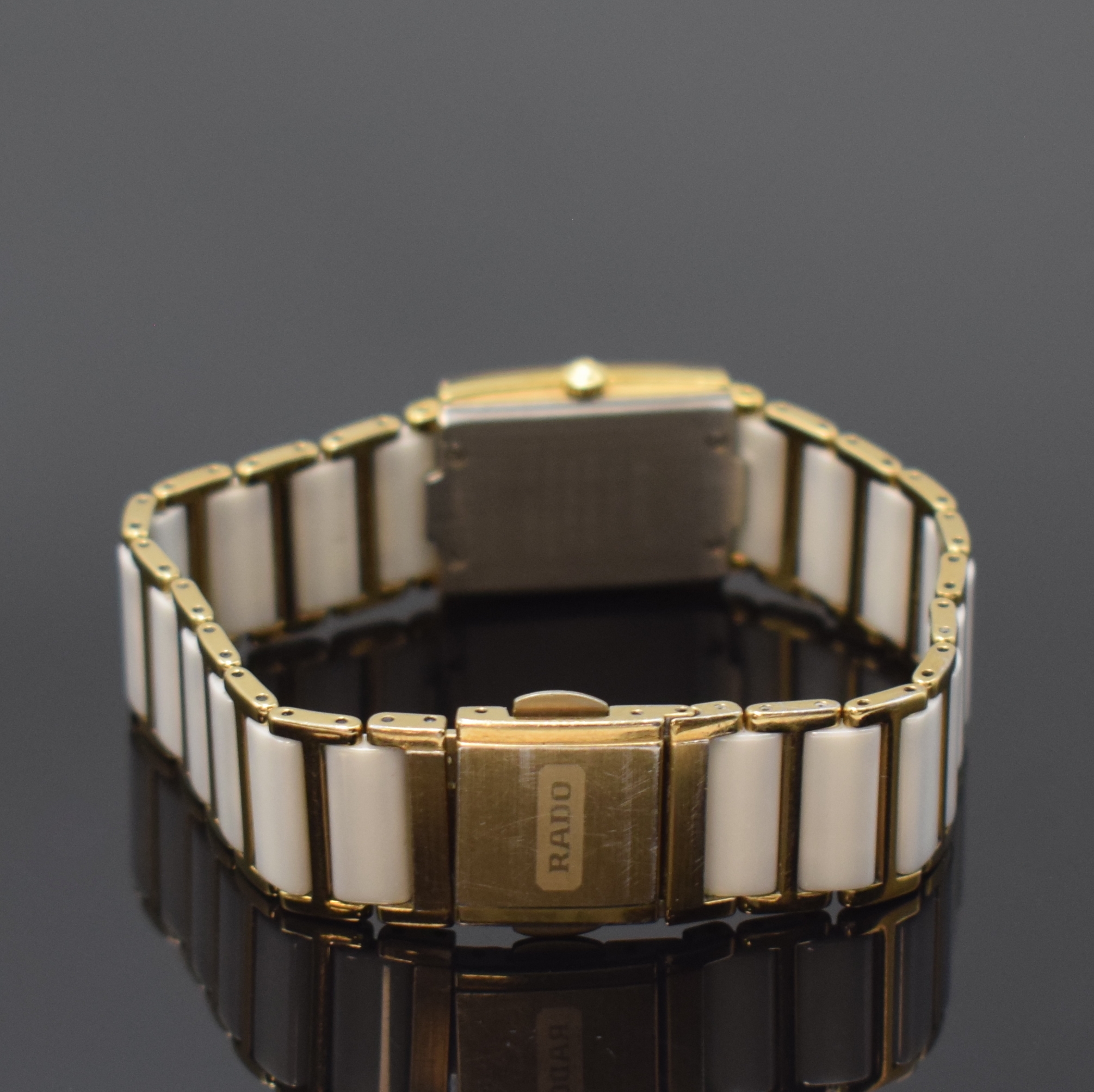 Detail b: RADO Diastar Damenarmbanduhr Keramik/vergoldet Referenz 153.0283.3N, Schweiz um 2000, quarz, vergold., rechteck. Geh. m. gebogenem Saphirglas, ...
