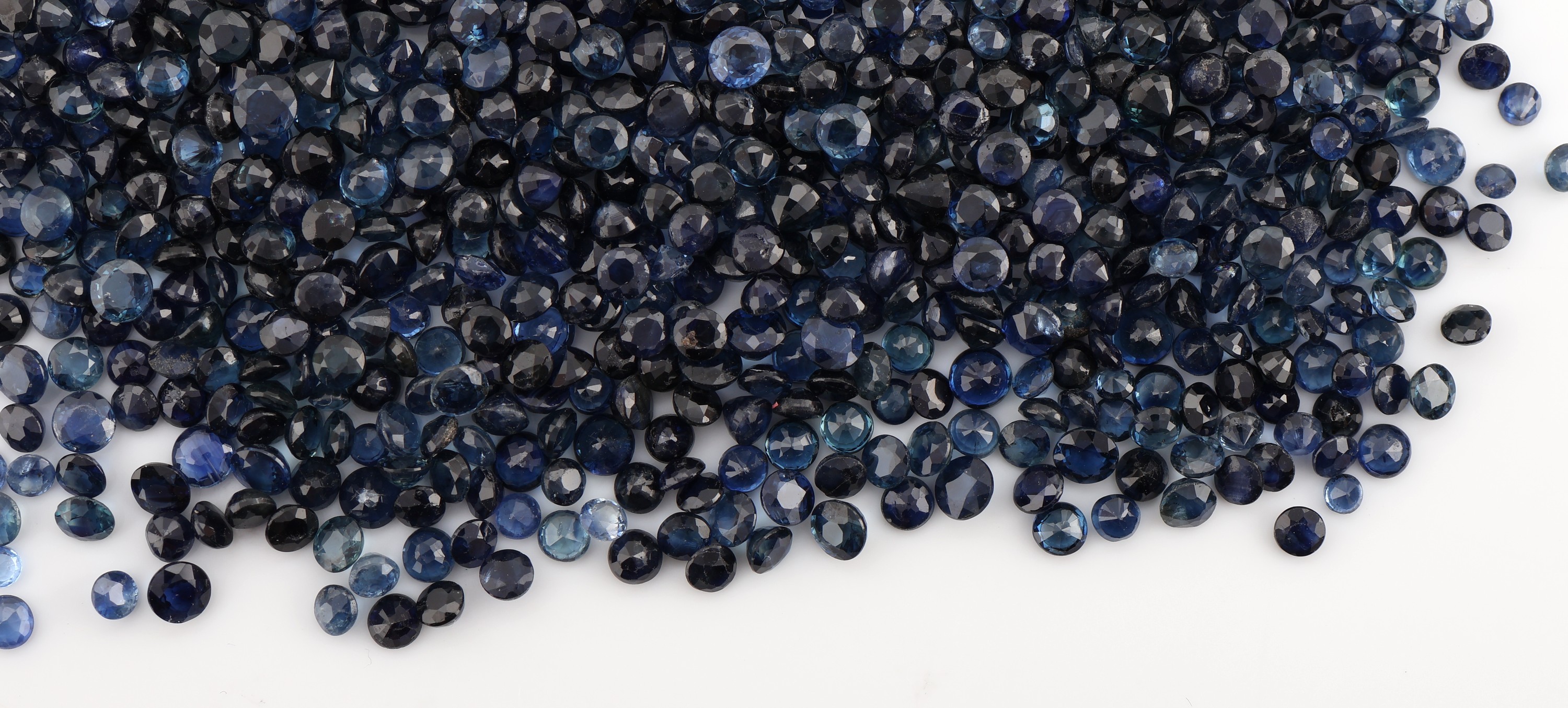Detail a: Lot lose Saphire, rundfacett., zus. ca. 69.36 ct