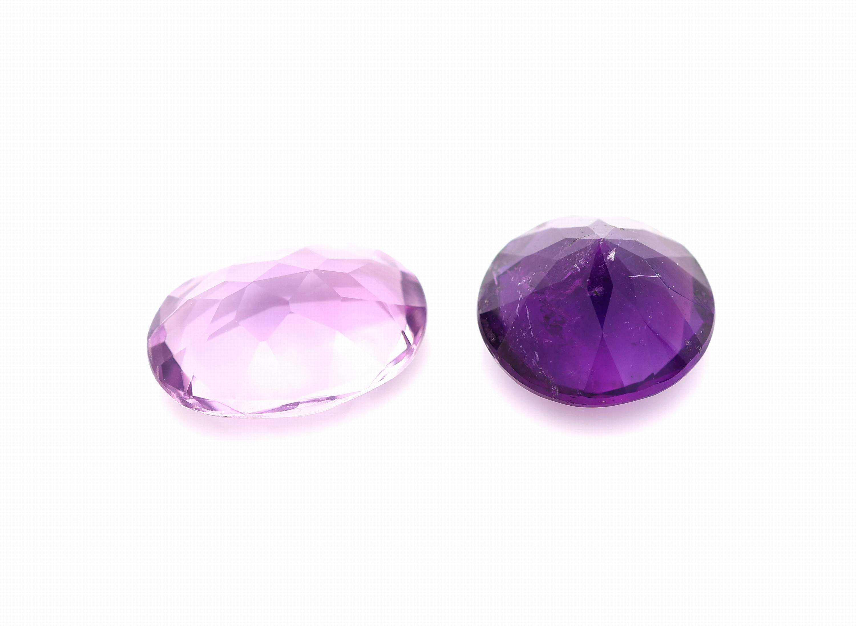 Detail c: Lot lose Amethyste, zus. ca. 730 ct, versch. Schliffformen, Farben und Qualitäten