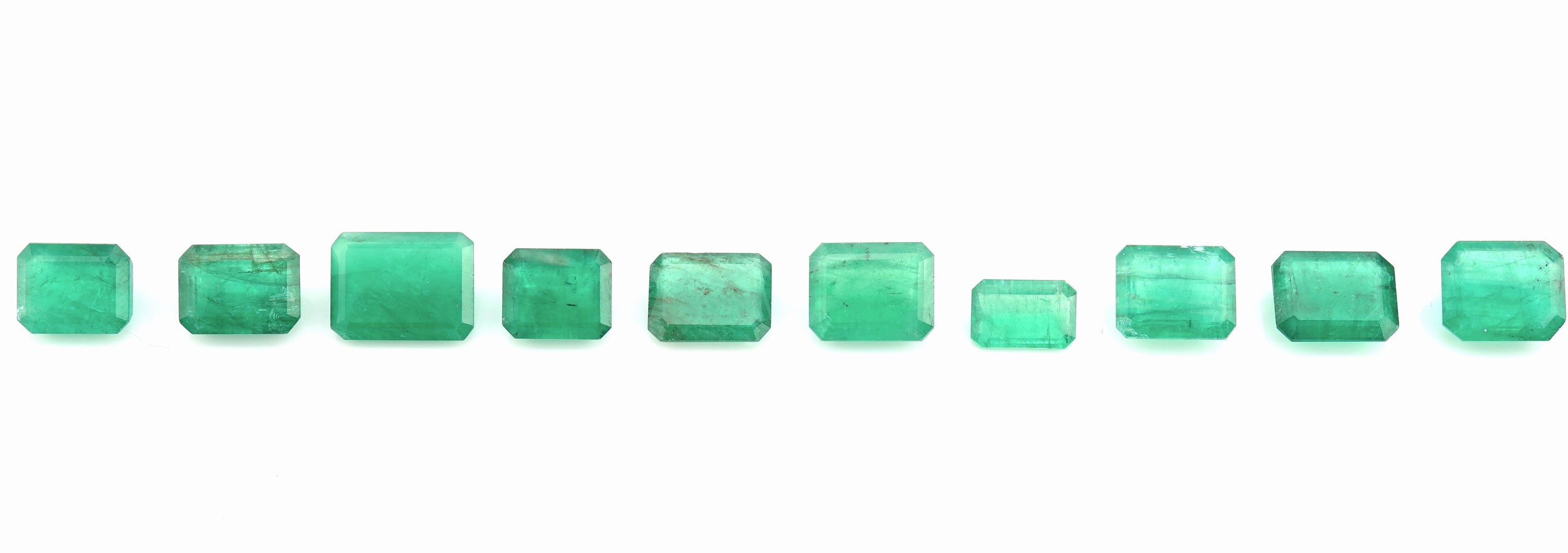 10 lose Smaragde, ca. 20.77 ct, Emerald- Cut, versch. Größen
