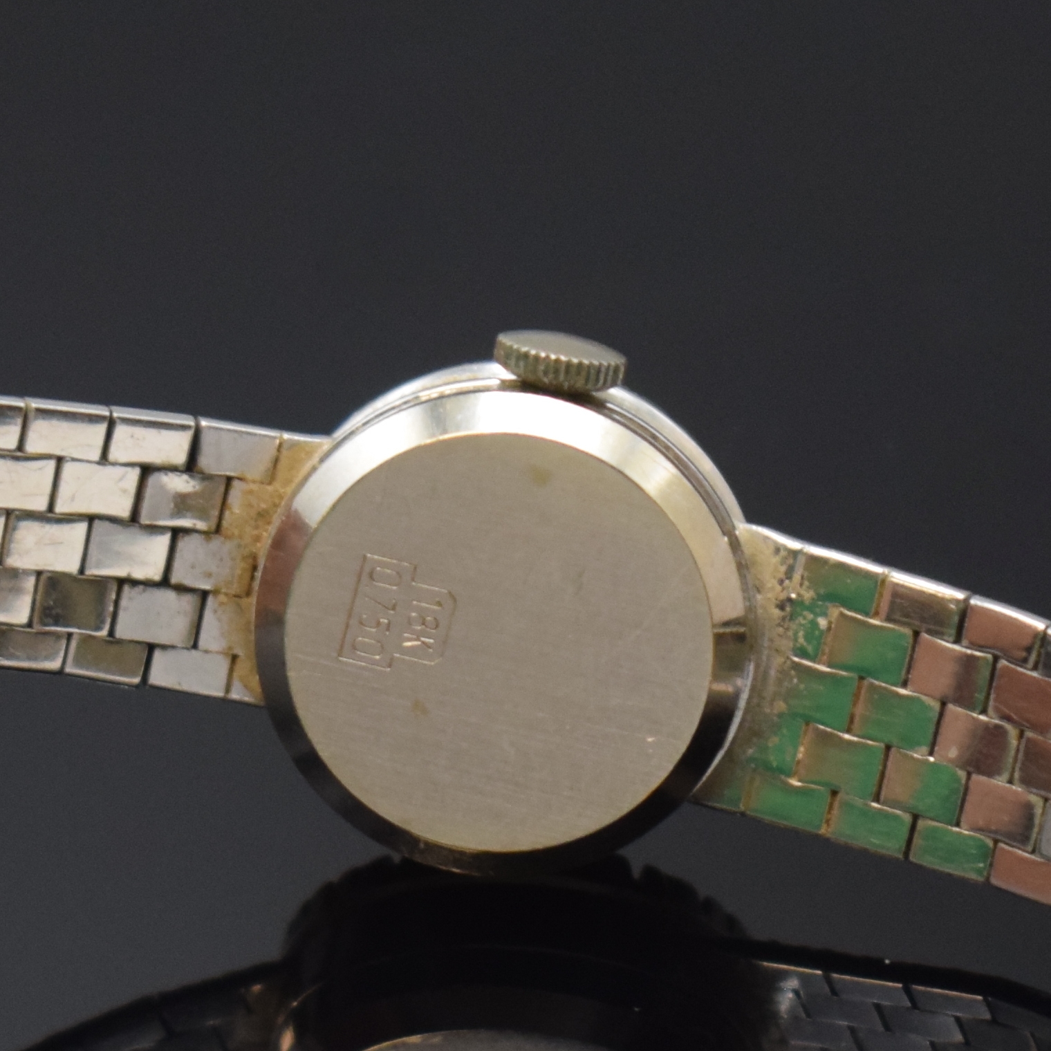 Detail c: REUSSER diamantbesetzte Damenarmbanduhr in WG 750/000, Schweiz um 1960, Handaufzug, 2- teil. Geh. m. aufgedr. Boden, anges. Band, silb. Zifferbl. m. ...