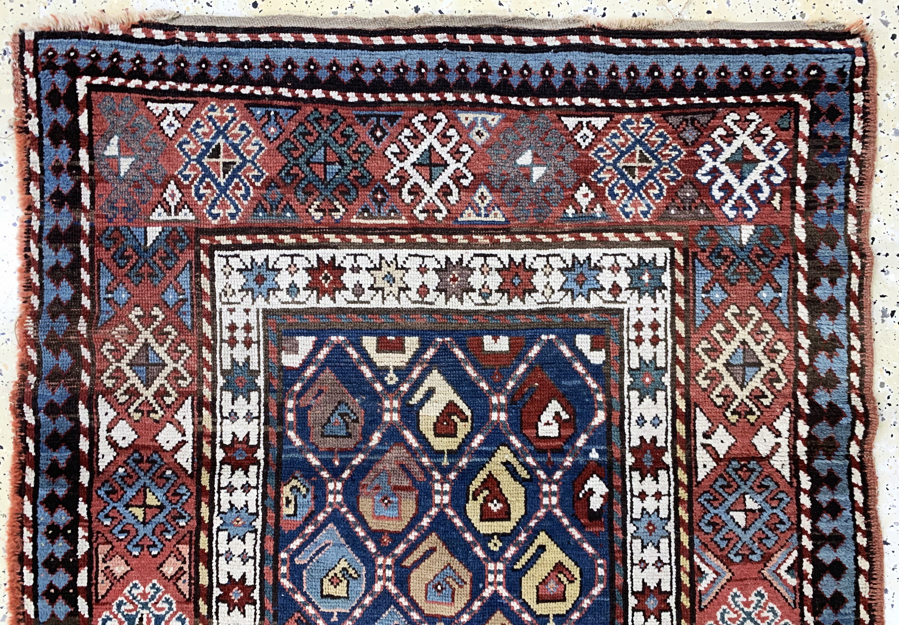 Detail a: Antiker"Moghan", Kaukasus, 19.Jhd, Wolle auf Wolle, ca. 240 x 120 cm, EHZ: 4