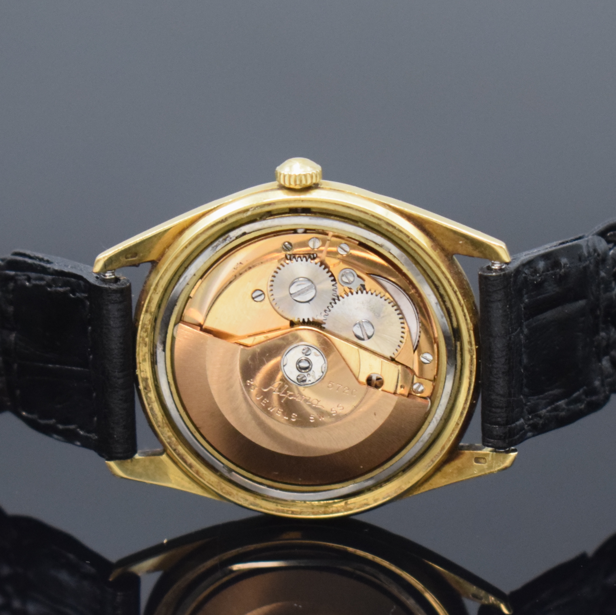 Detail d: ALPINA President Herrenarmbanduhr in GG 750/000, Automatik, Schweiz 1960er Jahre, Boden geschr., silb. Zifferbl. m. aufgel. Indizes, Zentralsek., ...