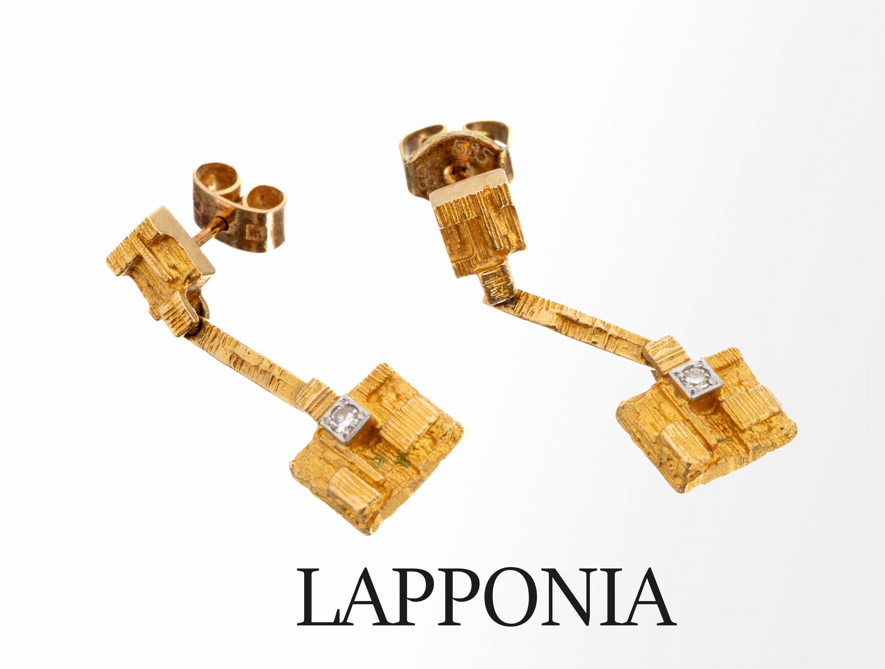 Paar 18 kt Gold LAPPONIA Ohrstecker, Finnland 1980, GG 750/000, typ. Lapponiadesign, kl. Diamantbesatz, L. ca. 2.5 cm, ca. 4.5 g, 1 Brisur GG 585/000