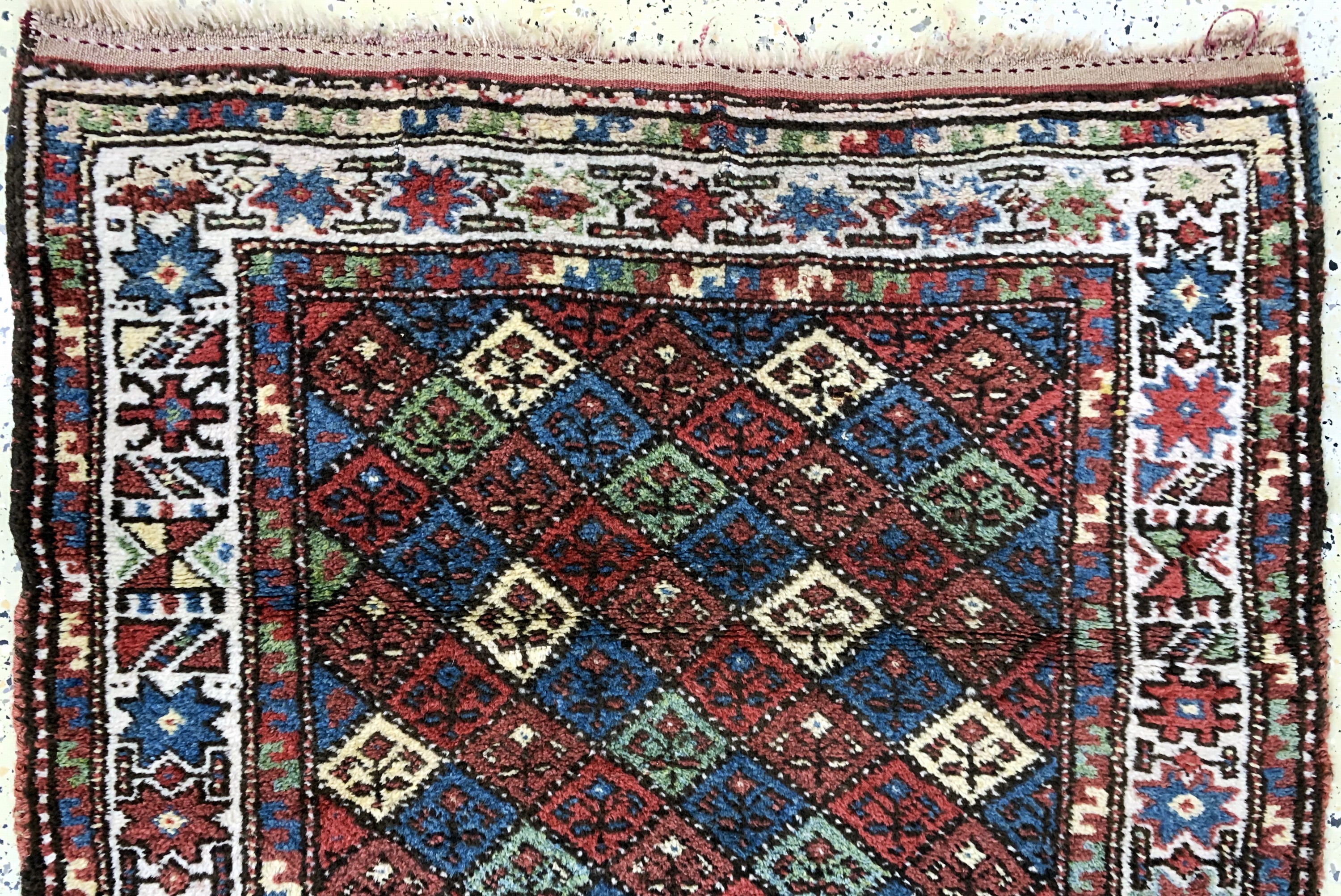 Detail a: Kurdischer"Dorfteppich", Persien, um 1900, Wolle auf Wolle, ca. 165 x 107 cm, EHZ: 2-3