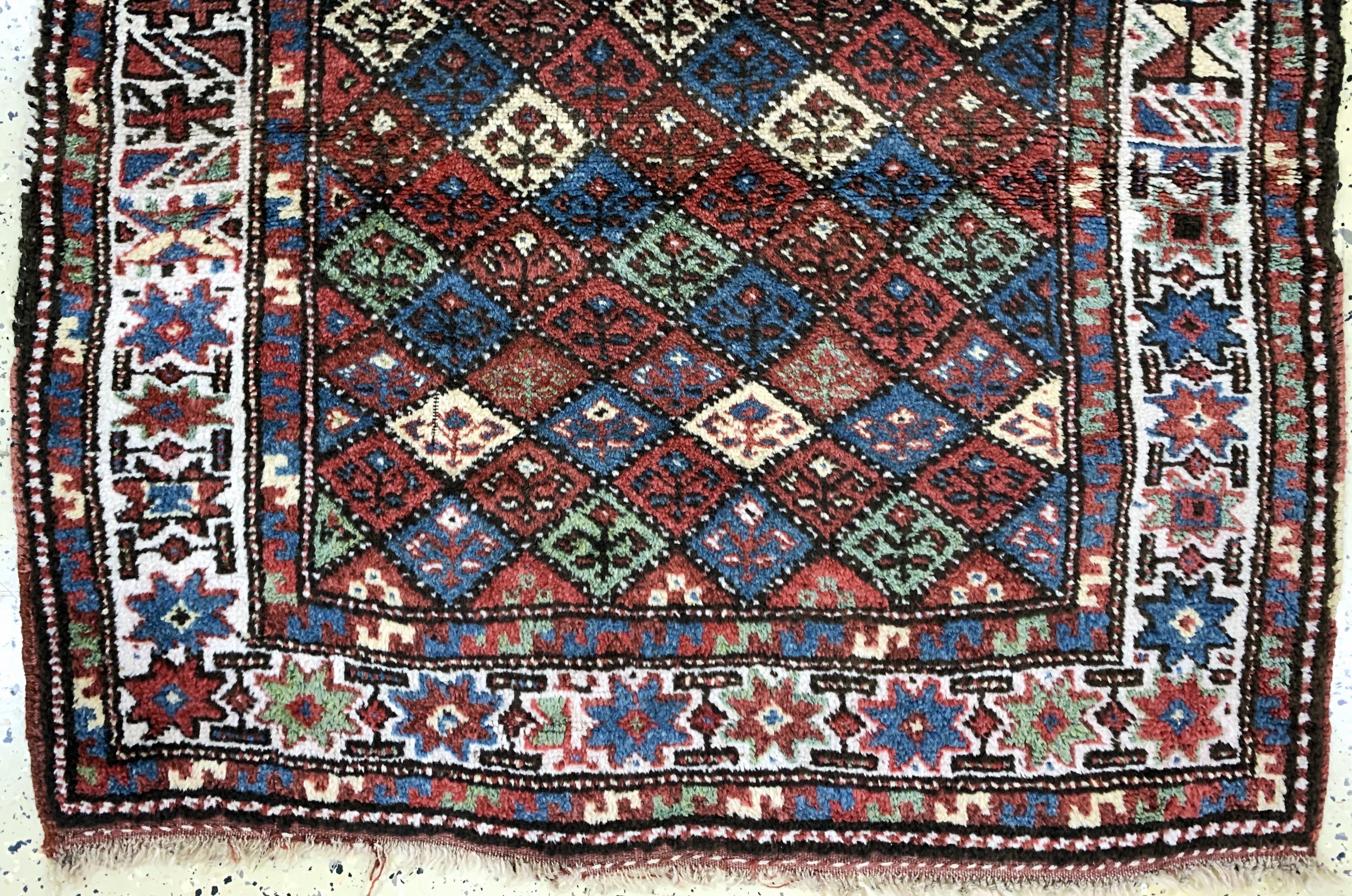 Detail c: Kurdischer"Dorfteppich", Persien, um 1900, Wolle auf Wolle, ca. 165 x 107 cm, EHZ: 2-3