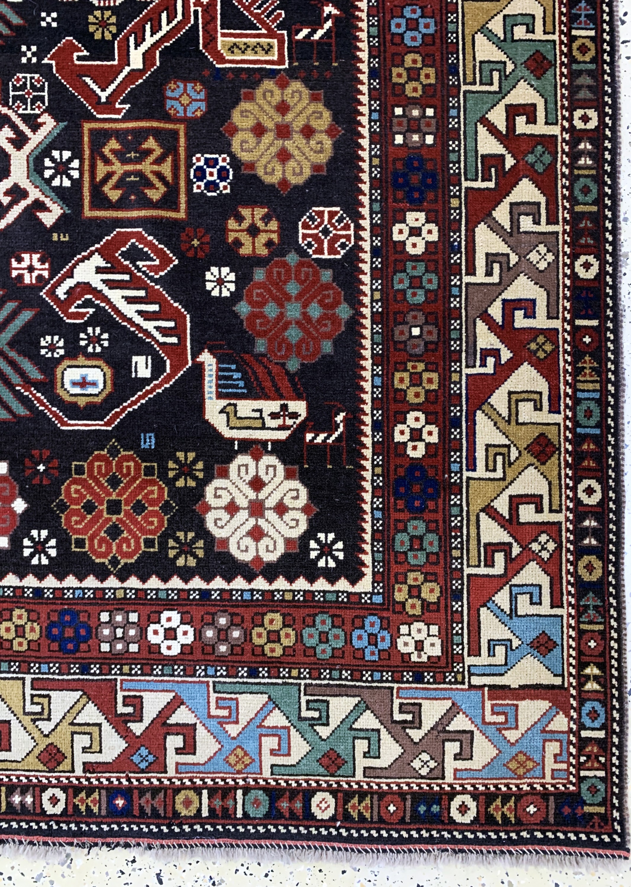 Detail a: Kazak alt, Kaukasus, Mitte 20.Jhd, Wolle auf Wolle, ca. 233 x 173 cm, EHZ: 2